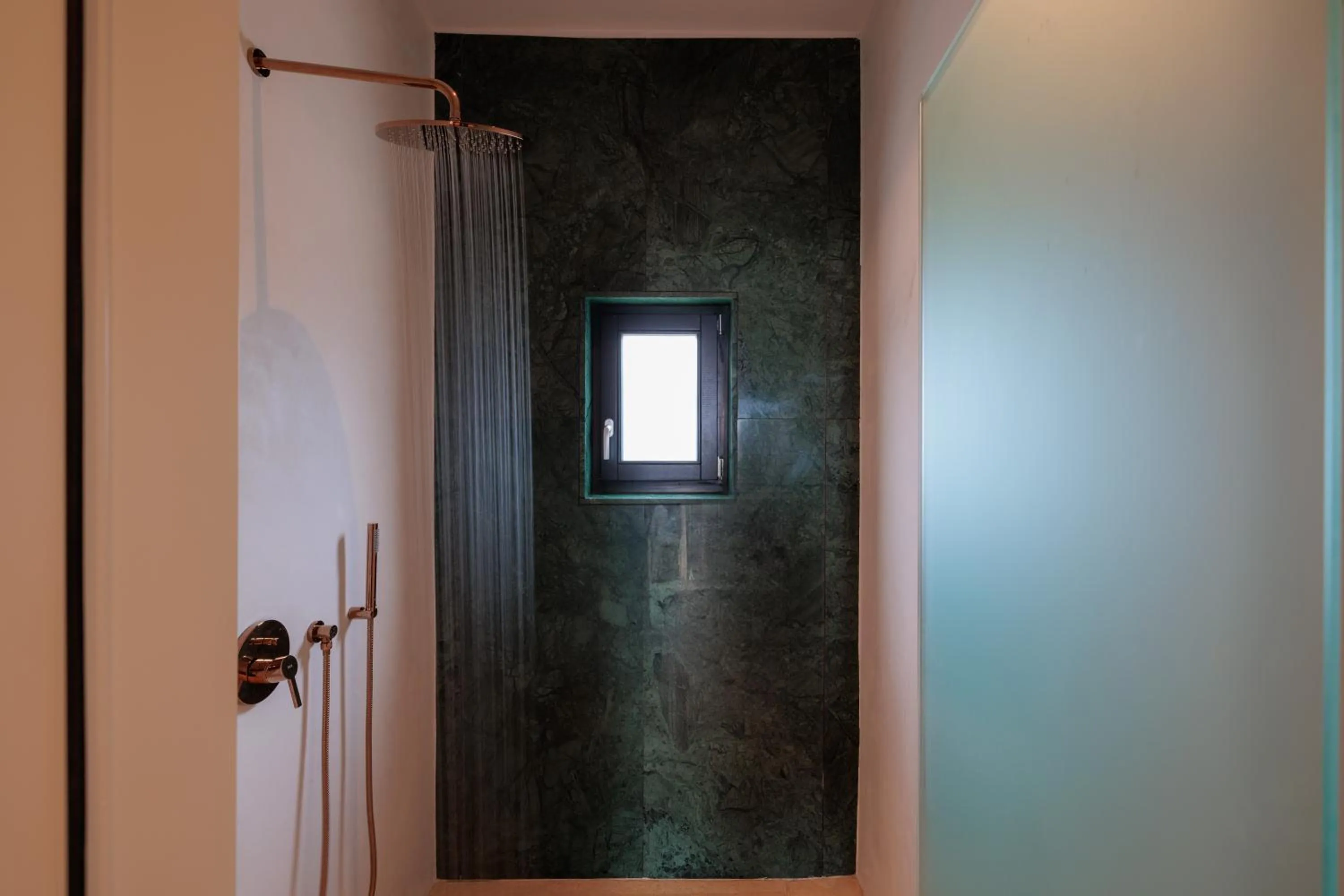 Shower in Asty Mykonos Hotel & Spa - World of One Hotel Group