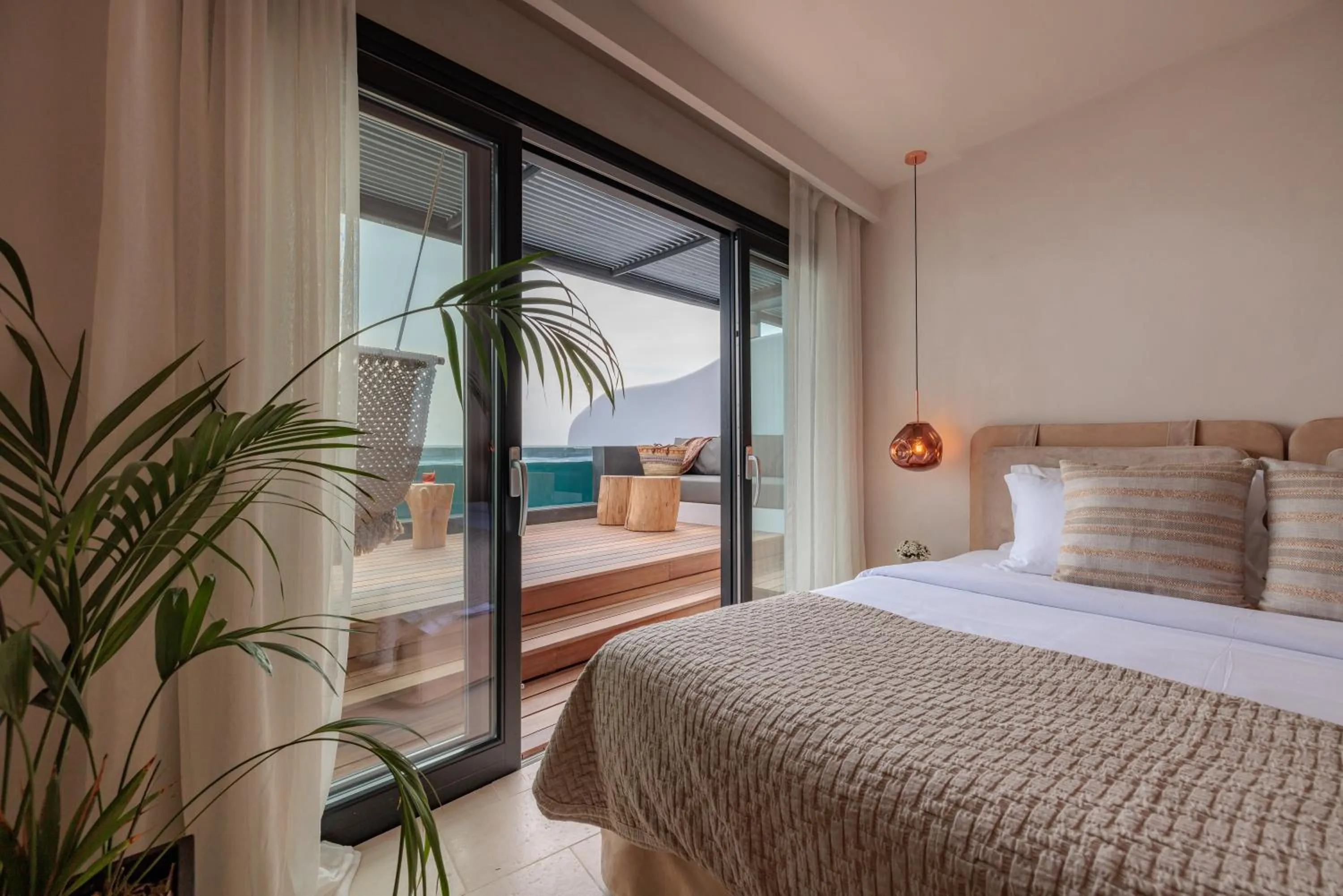 Bed in Asty Mykonos Hotel & Spa - World of One Hotel Group