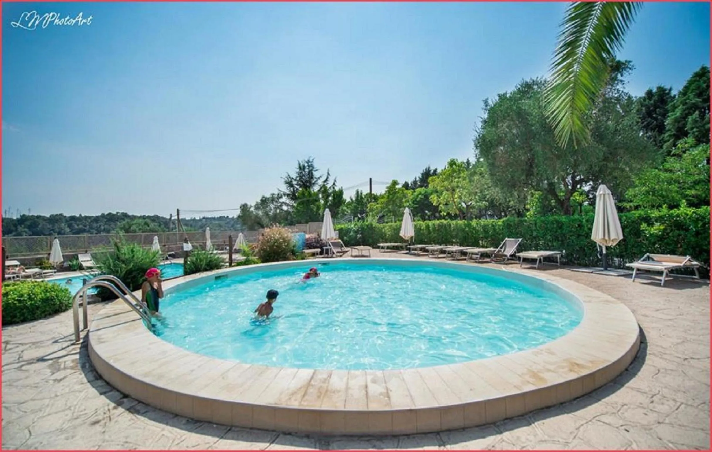 Swimming pool in Happy Village & Camping