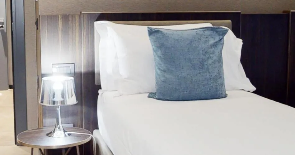 Bed in Hotel Vitruvio