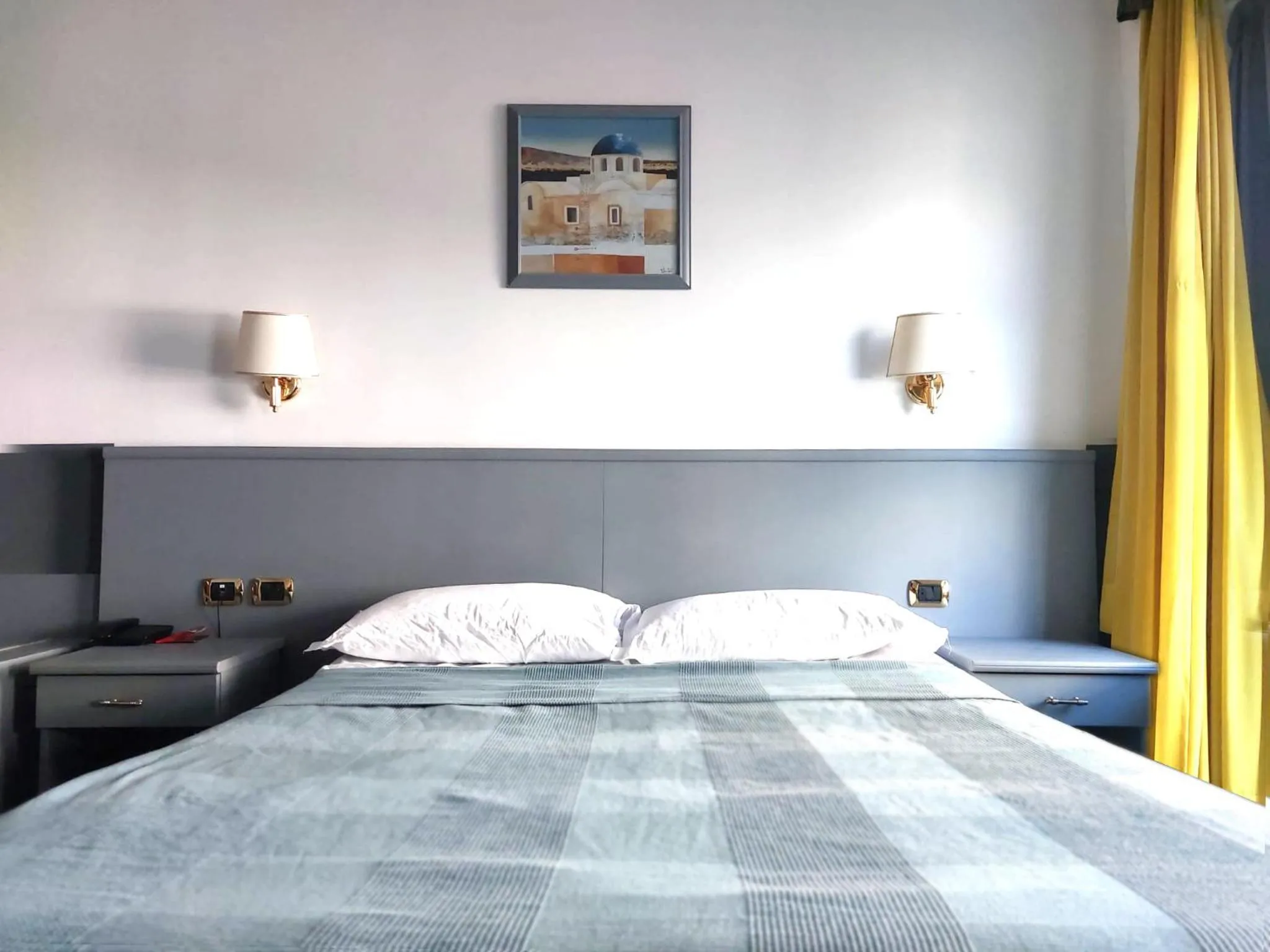 Bed in Hotel Vitruvio