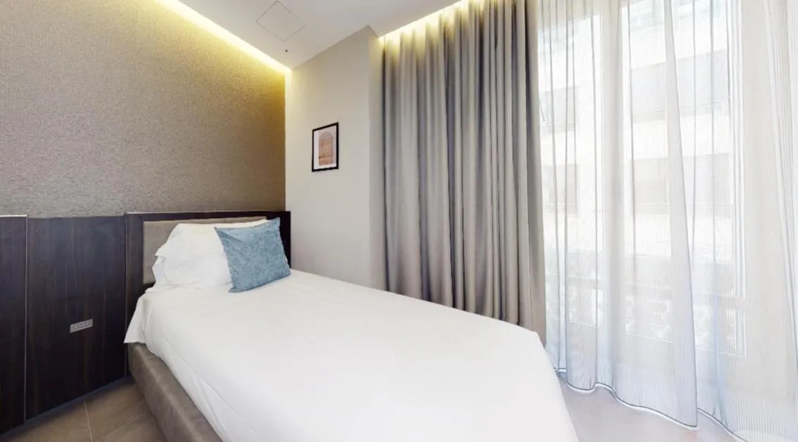 Bed in Hotel Vitruvio