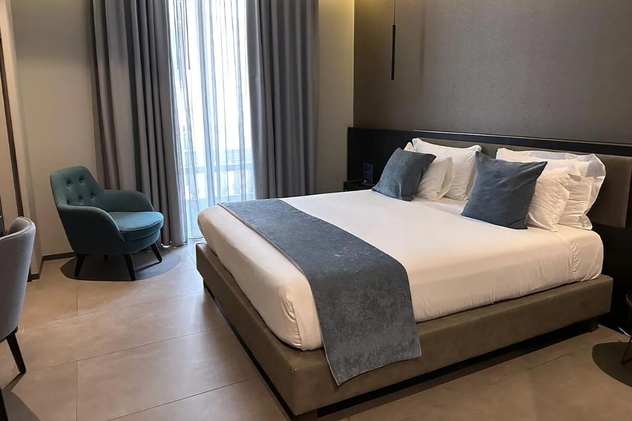 Bed in Hotel Vitruvio