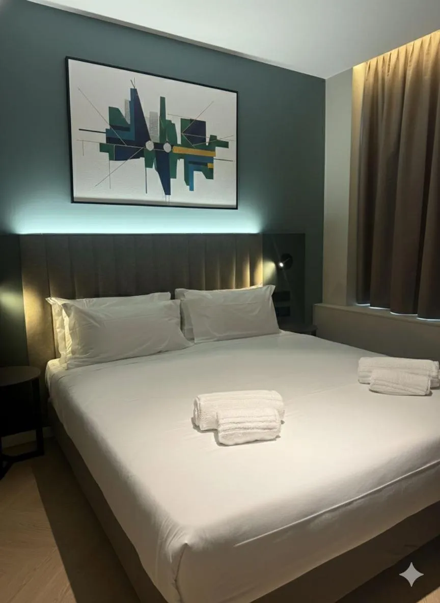 Bed in Hotel Vitruvio