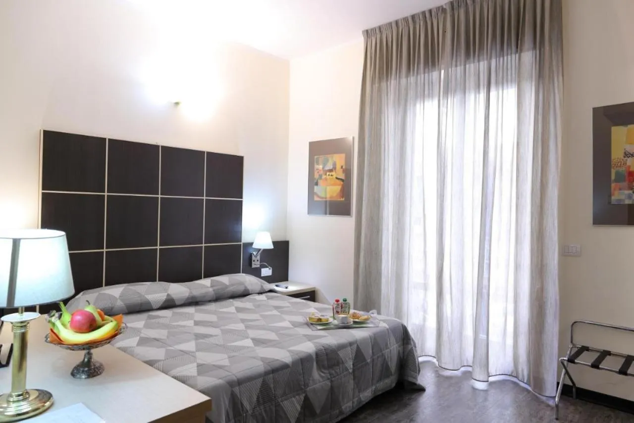 Bed in Hotel Vitruvio