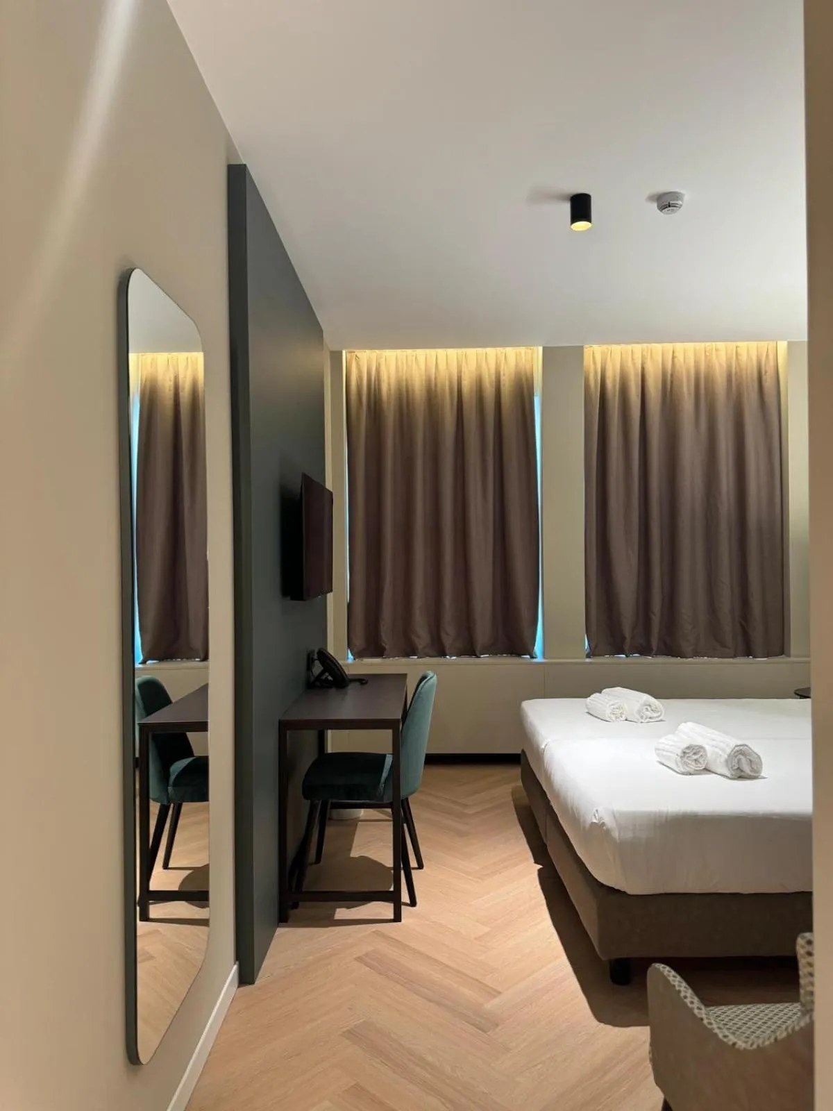 Bed in Hotel Vitruvio