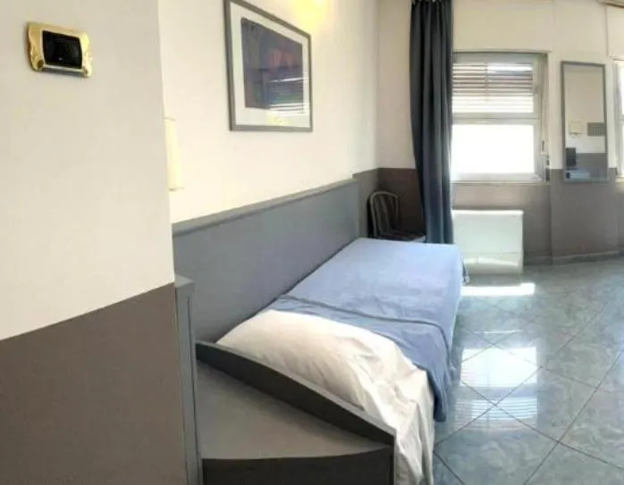 Bed in Hotel Vitruvio