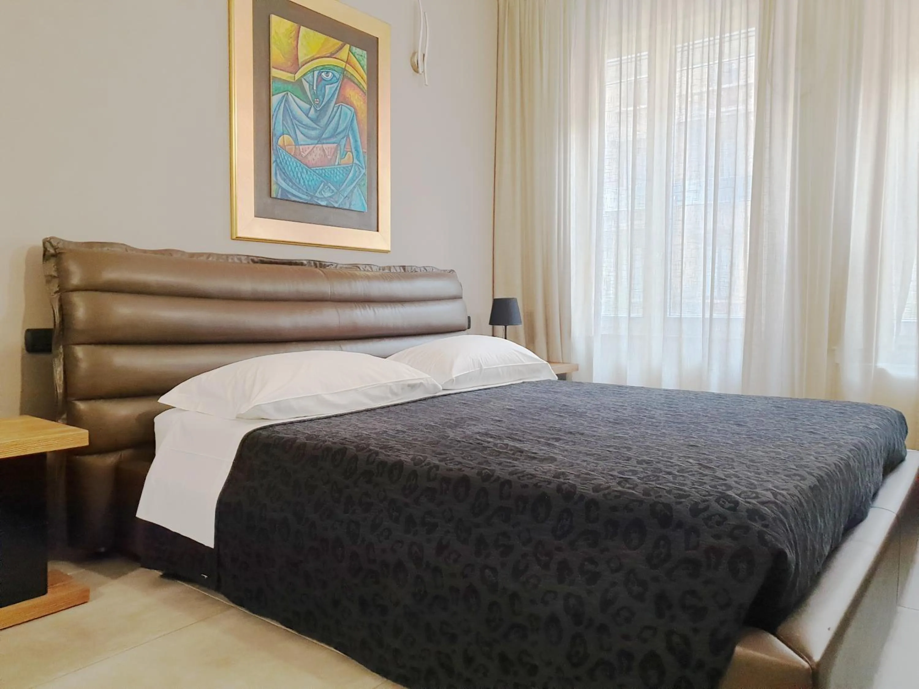 Bed in Hotel Vitruvio