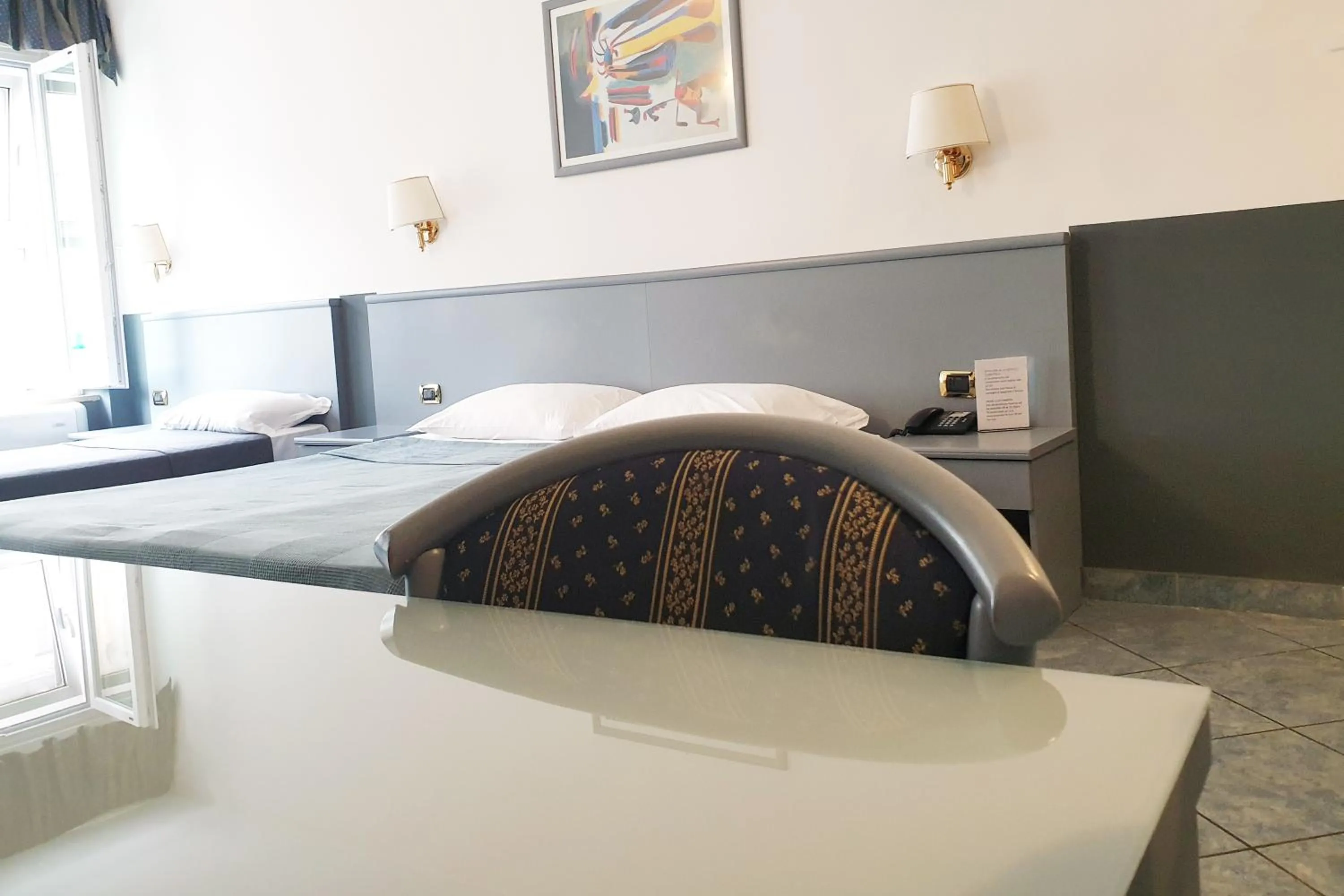 Bed in Hotel Vitruvio