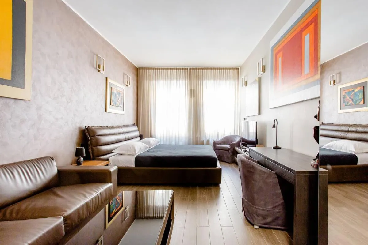 Living room, Bed in Hotel Vitruvio