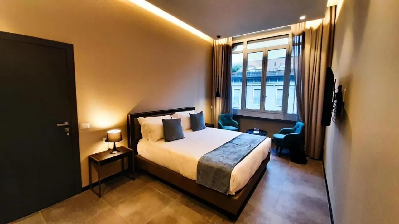 Bed in Hotel Vitruvio