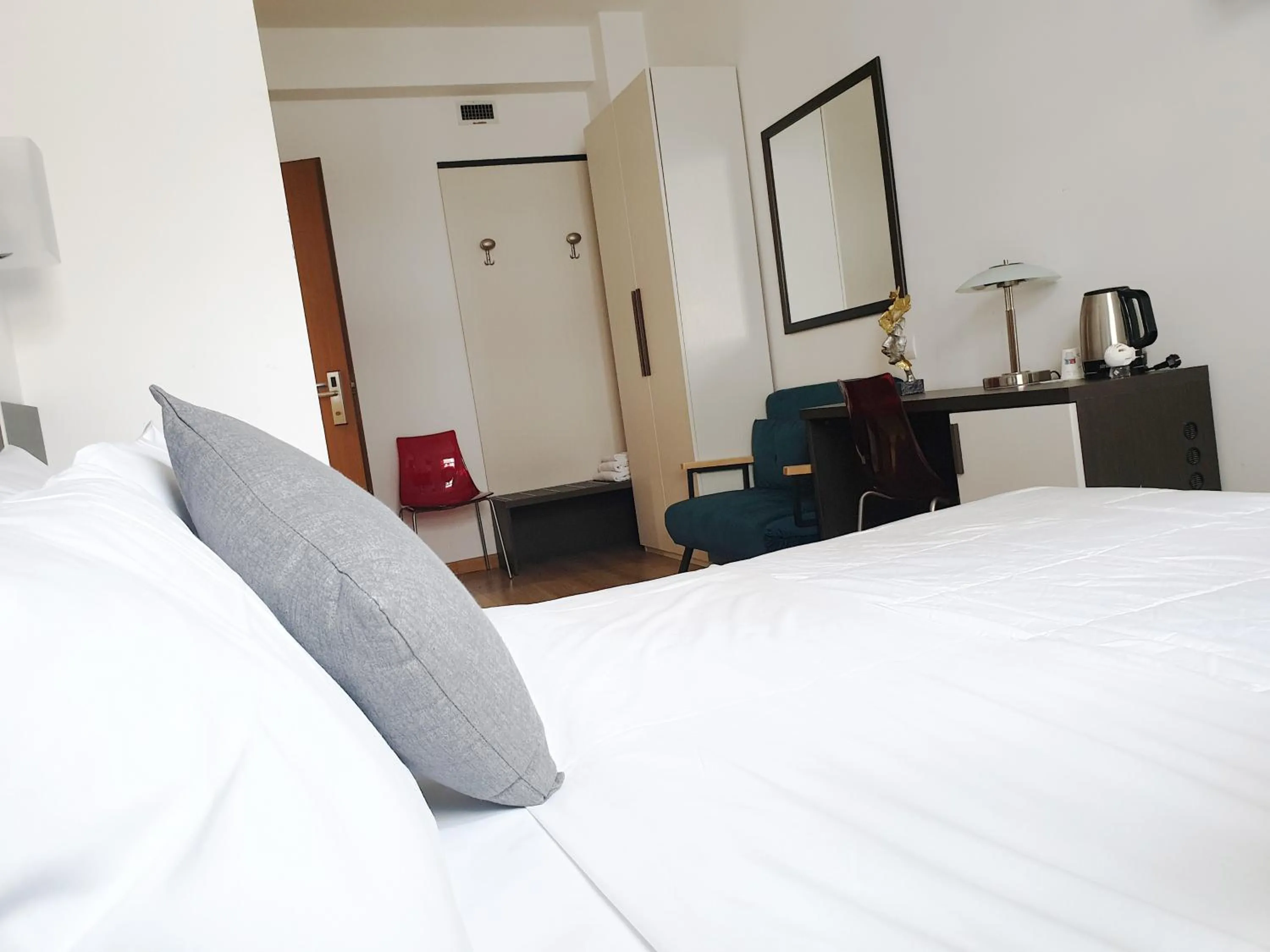 Bed in Hotel Vitruvio