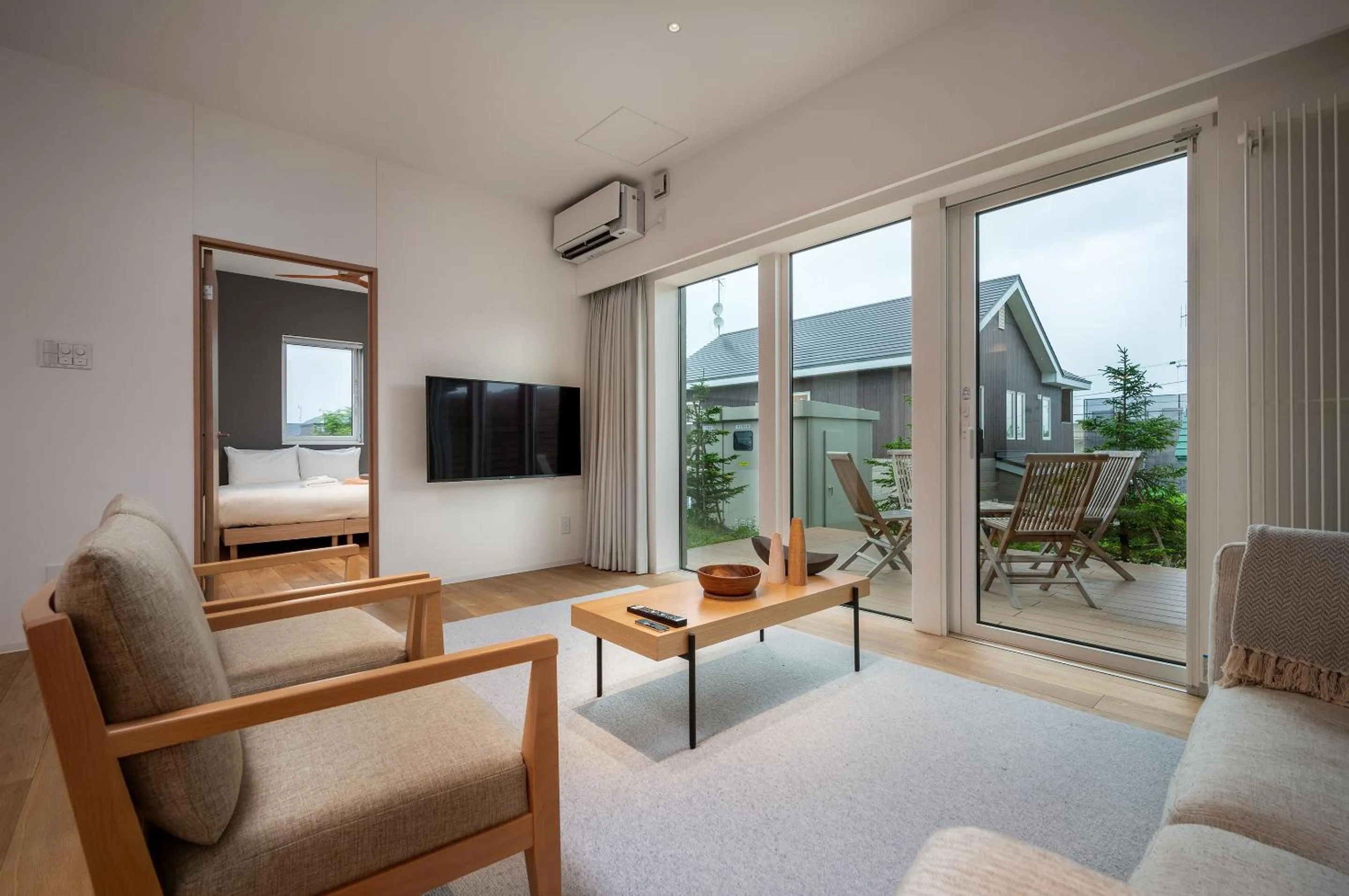 Living room in Kaku Place by H2 Life