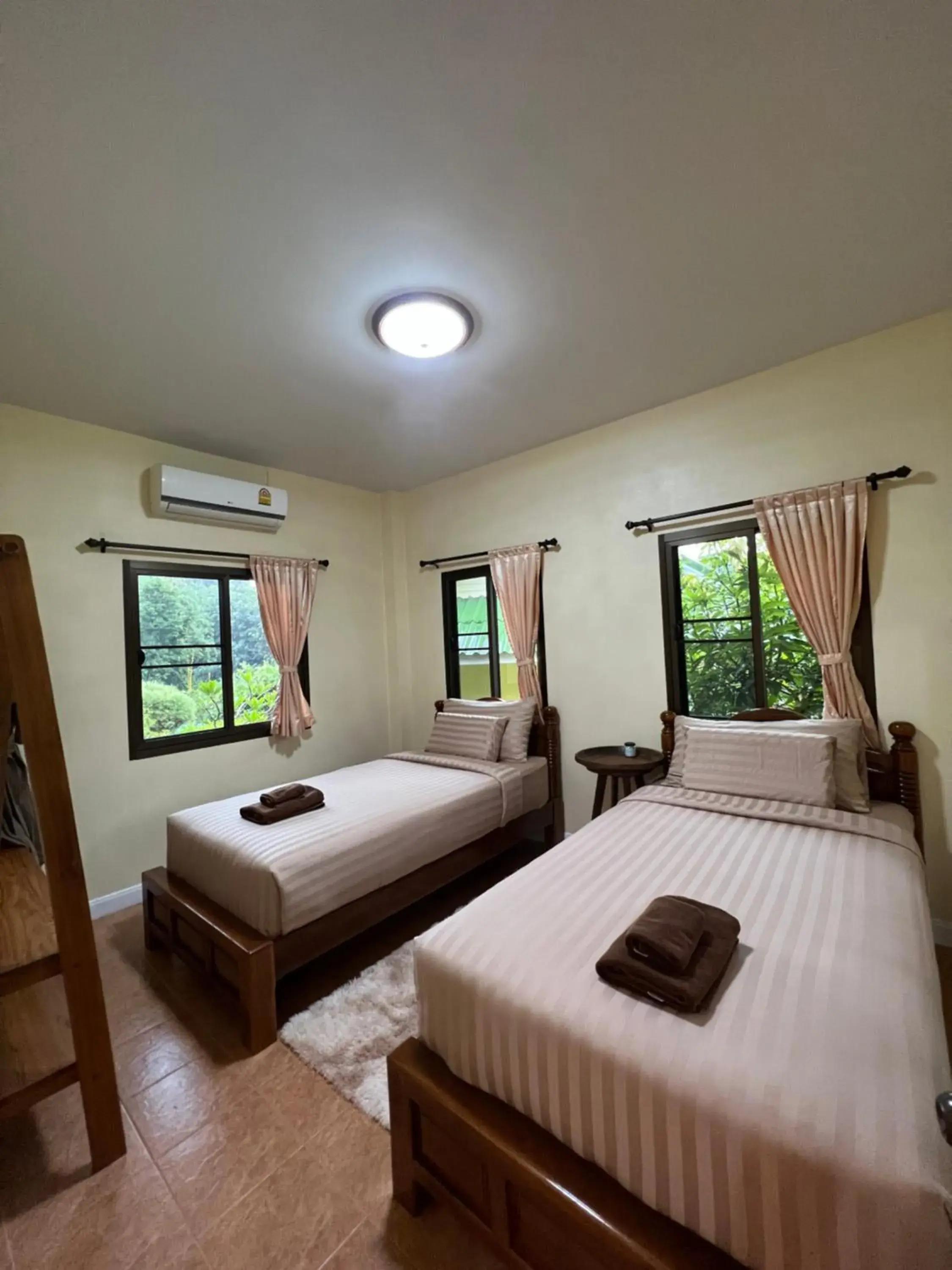 Bed in ViangPhing Resort Bed in ViangPhing Resort