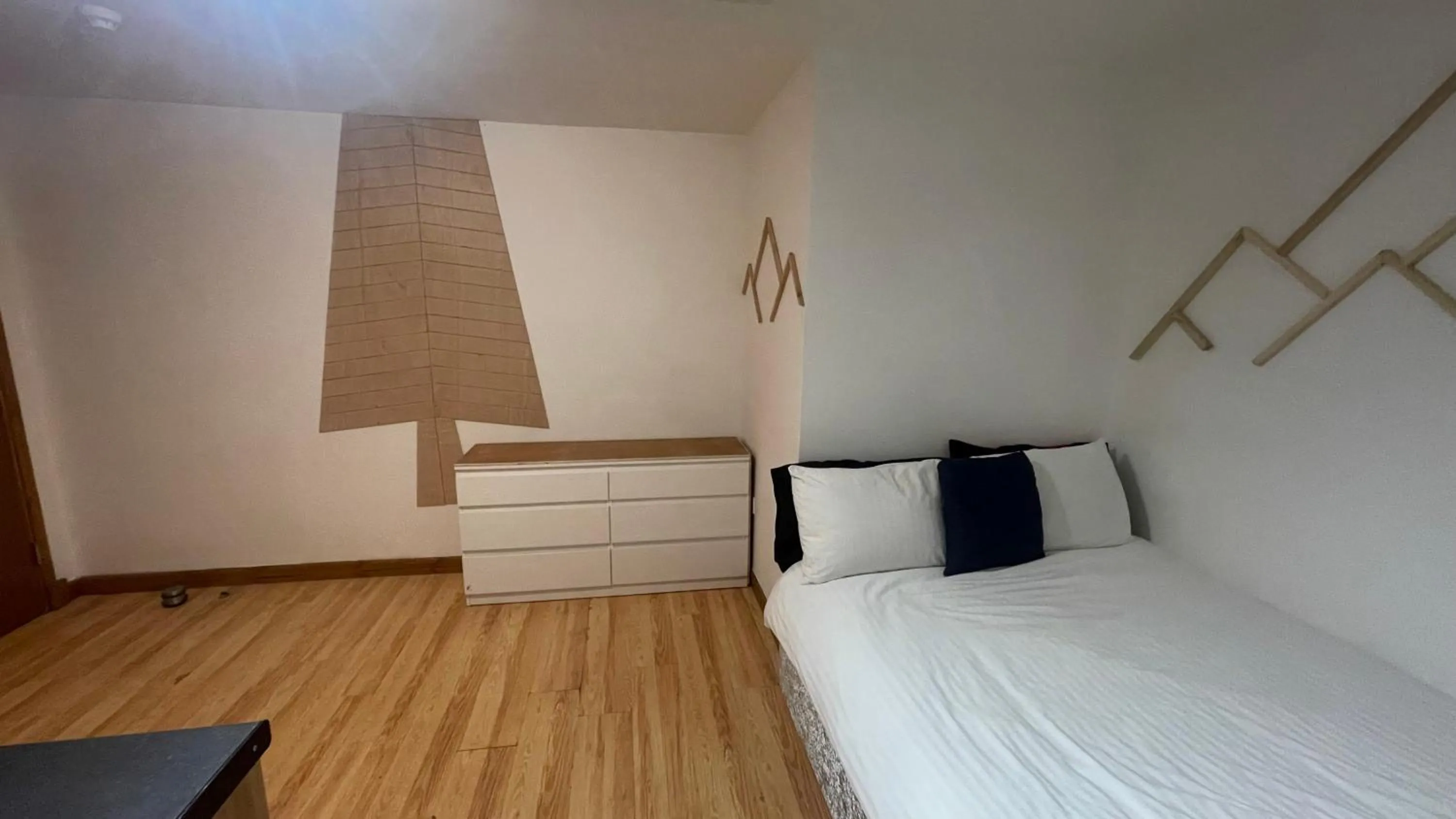 Bed in Bryn Bettws Lodge