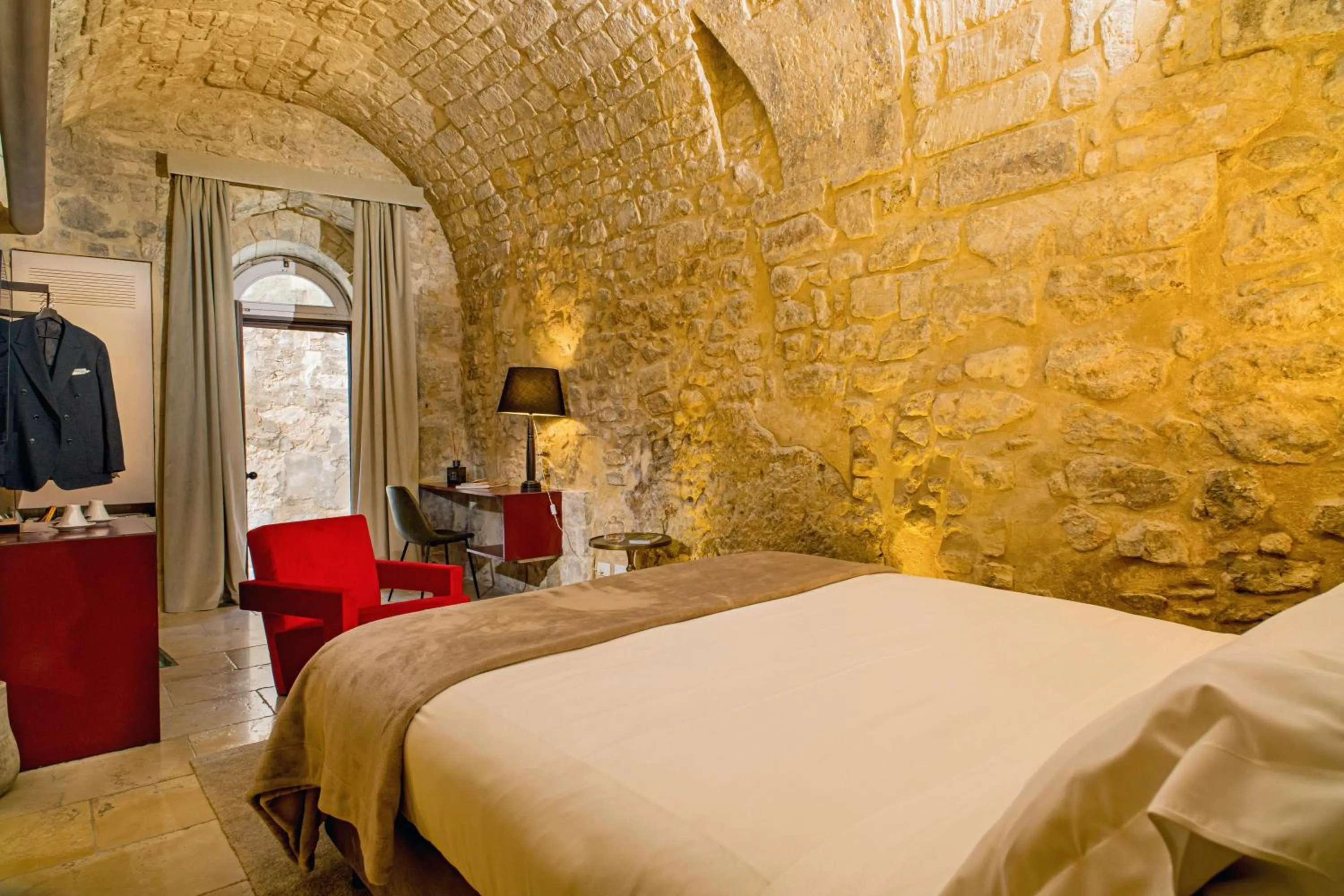 Photo of the whole room, Bed in Locanda Don Serafino Historical Boutique Hotel