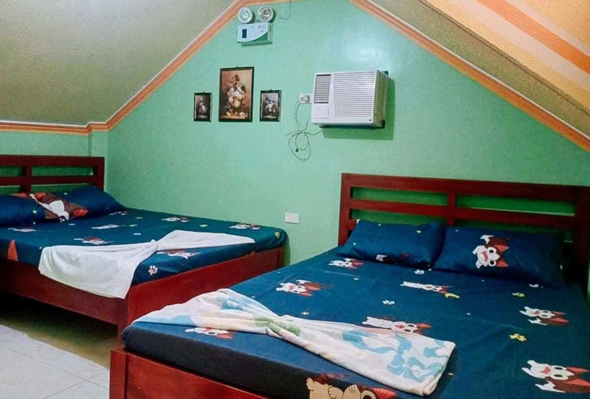 Bed in RedDoorz at Precious Dem Beach Resort Pagudpud