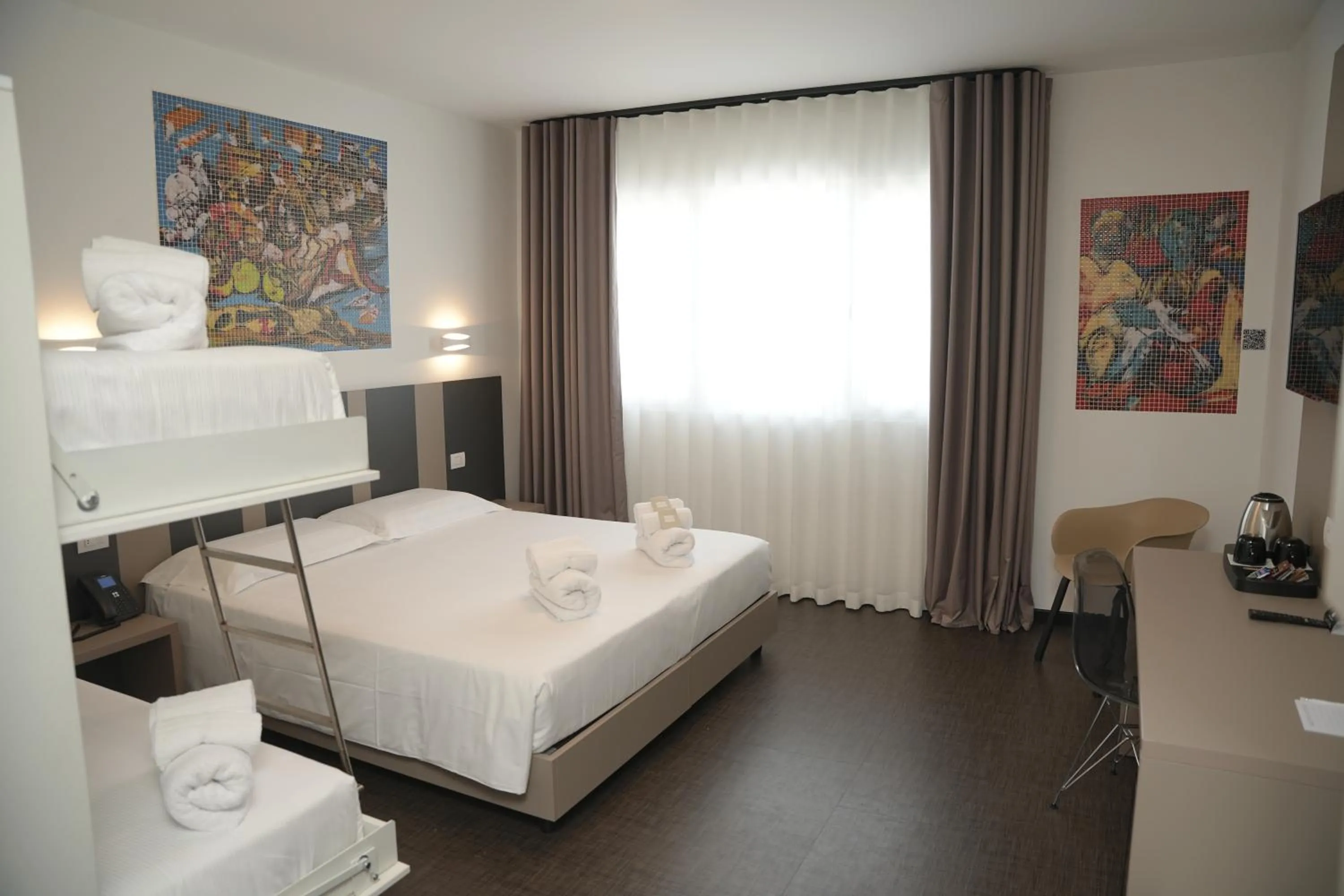 Bed in HOTEL MOSAICO