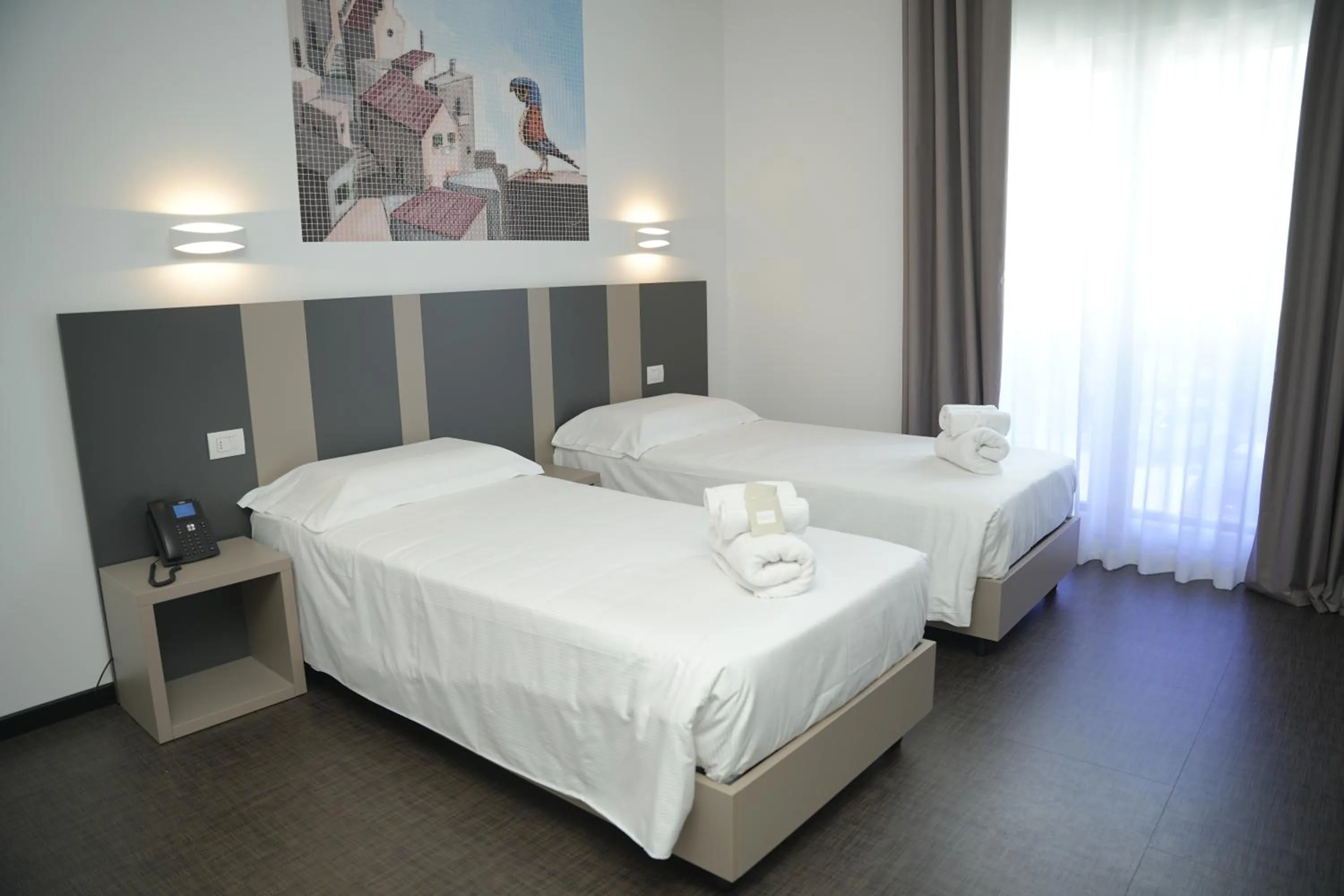 Bed in HOTEL MOSAICO