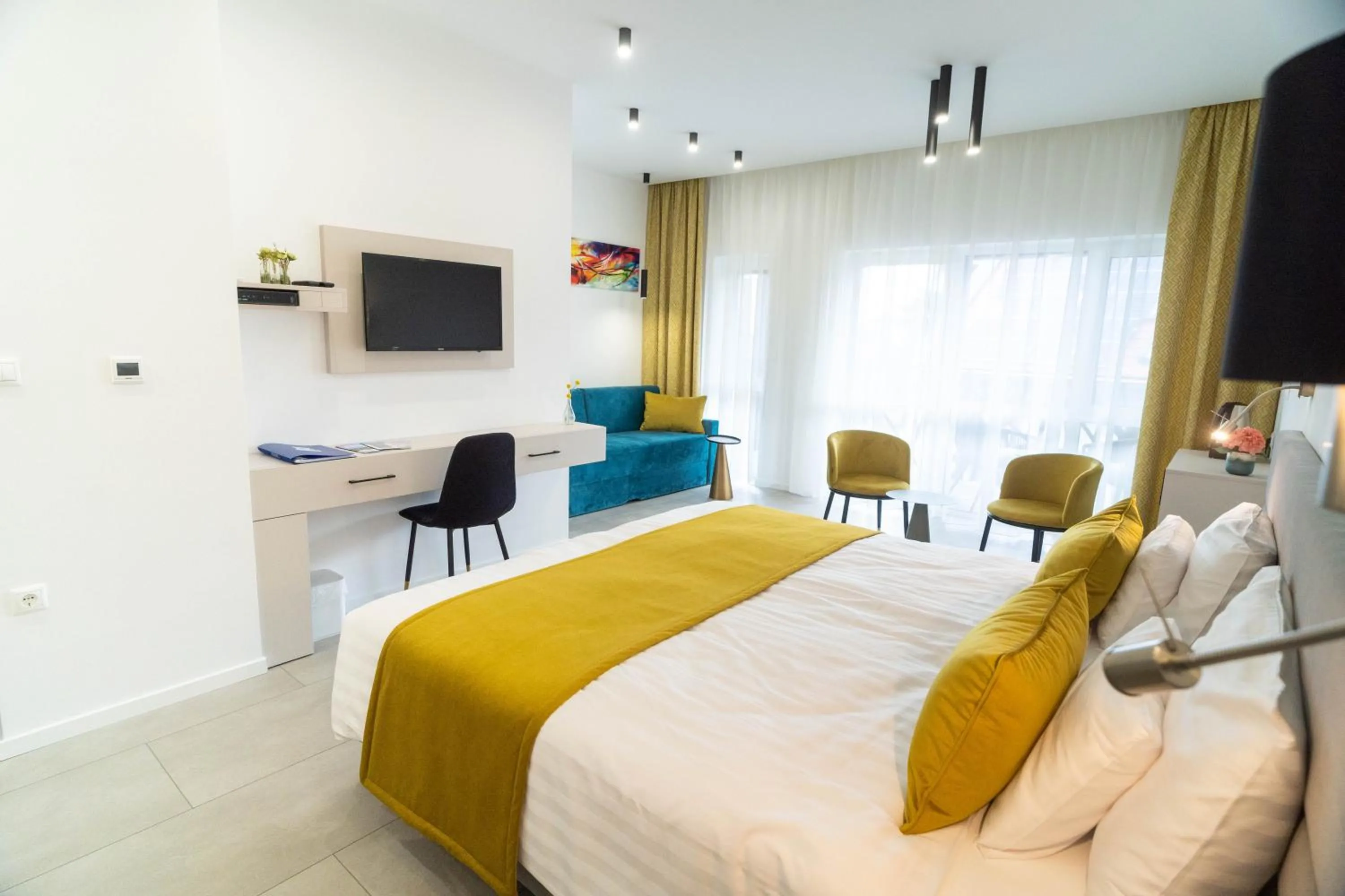 Photo of the whole room, Bed in La Vita Prémium Panzió