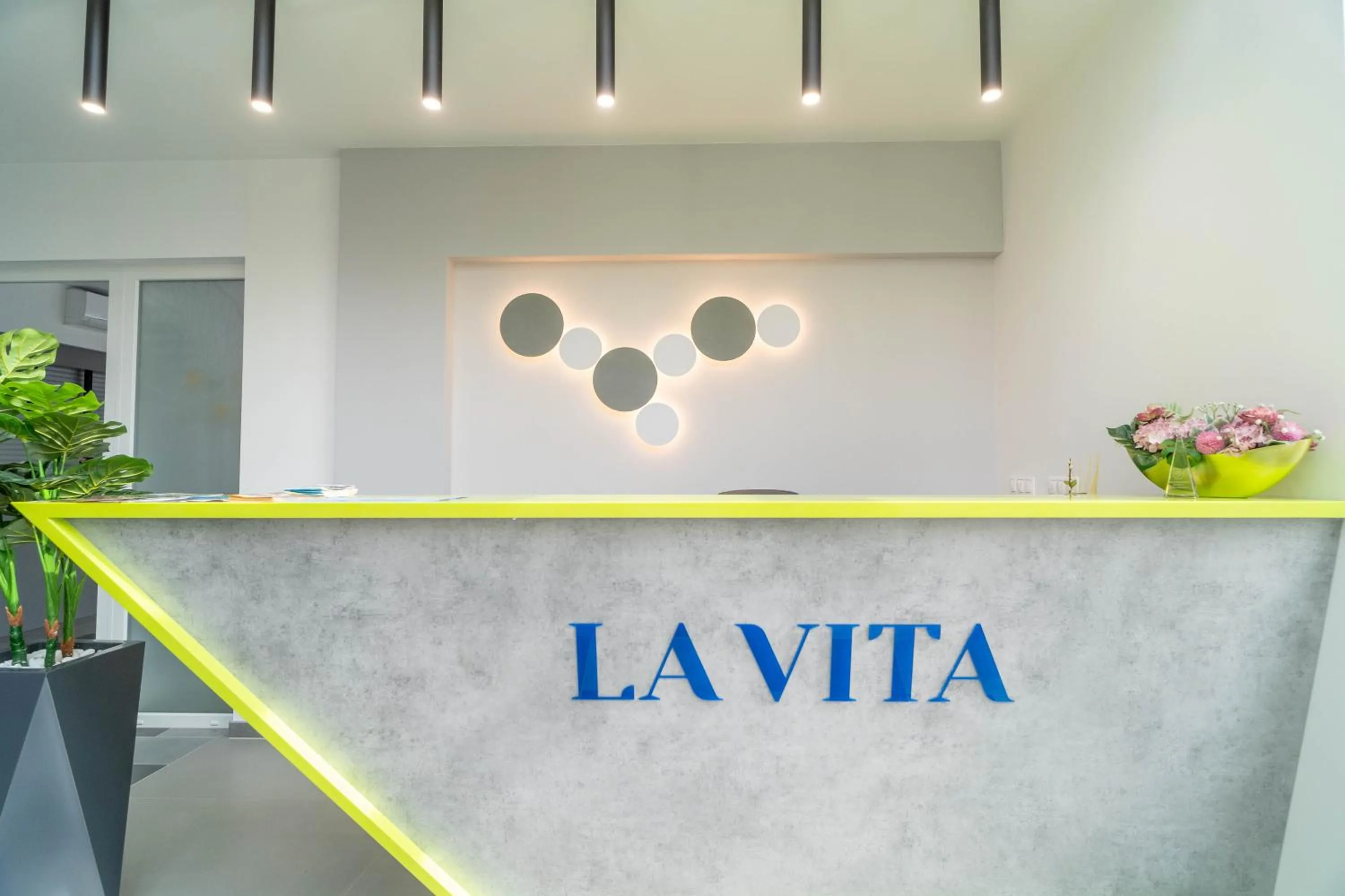 Property logo or sign in La Vita Prémium Panzió