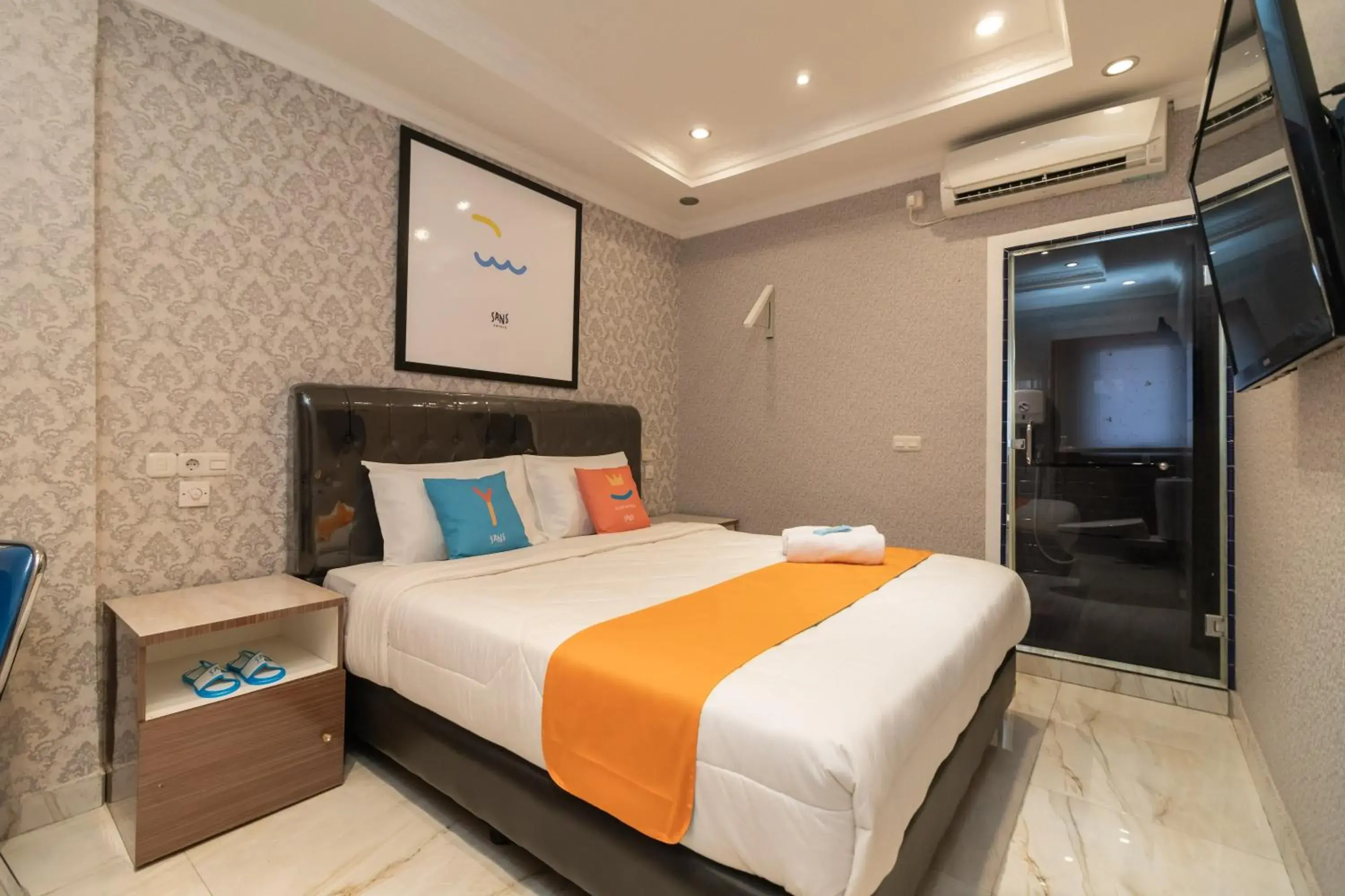 Bedroom, Bed in Sans Hotel Beauty Palembang Bedroom, Bed in Sans Hotel Beauty Palembang