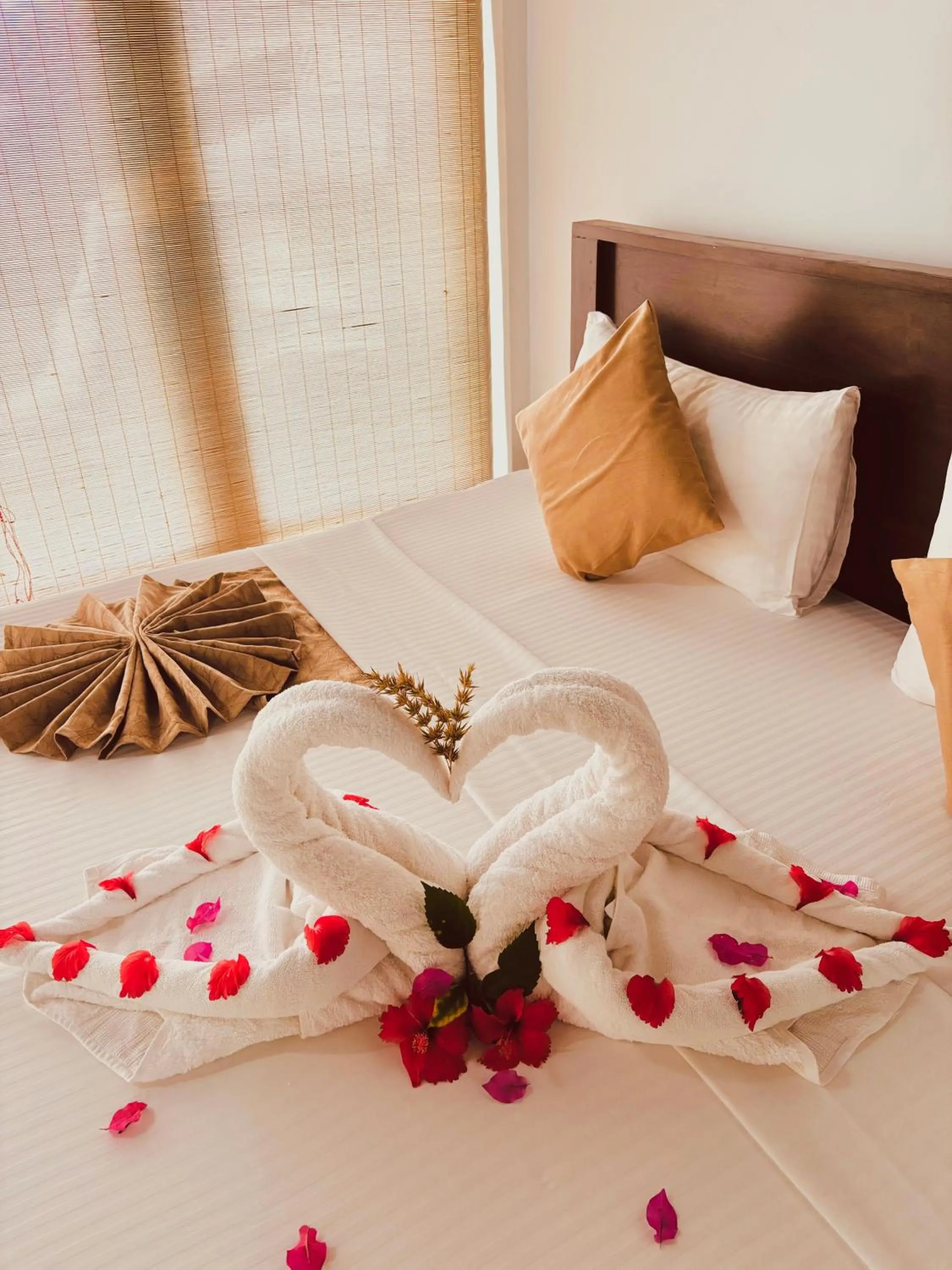 Bed in Lolu Village Resort