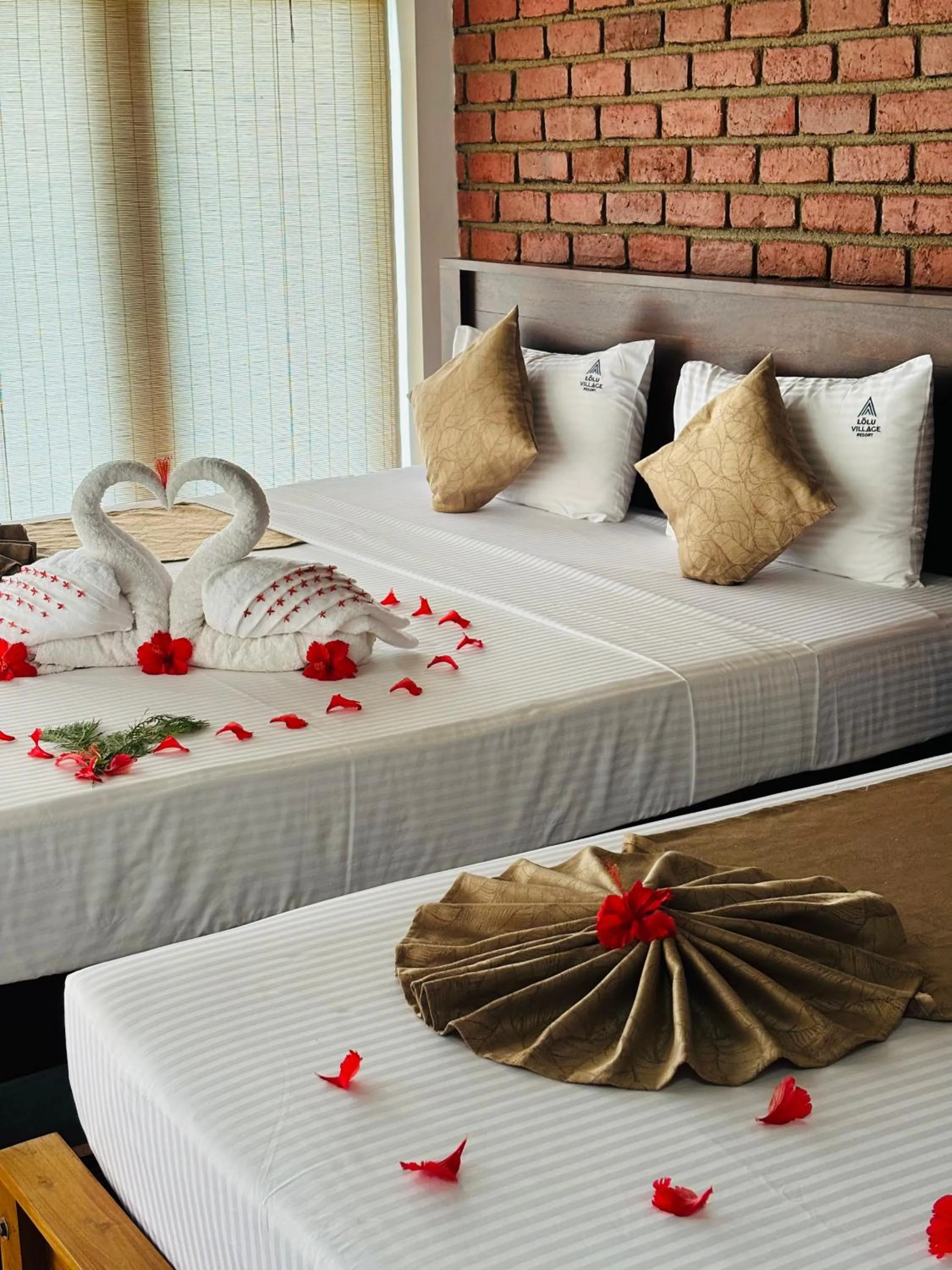 Bed in Lolu Village Resort