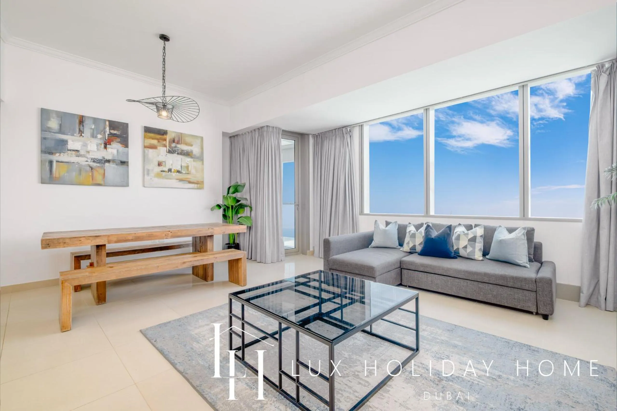 Living room in LUX The Sky View Suite Dubai Marina