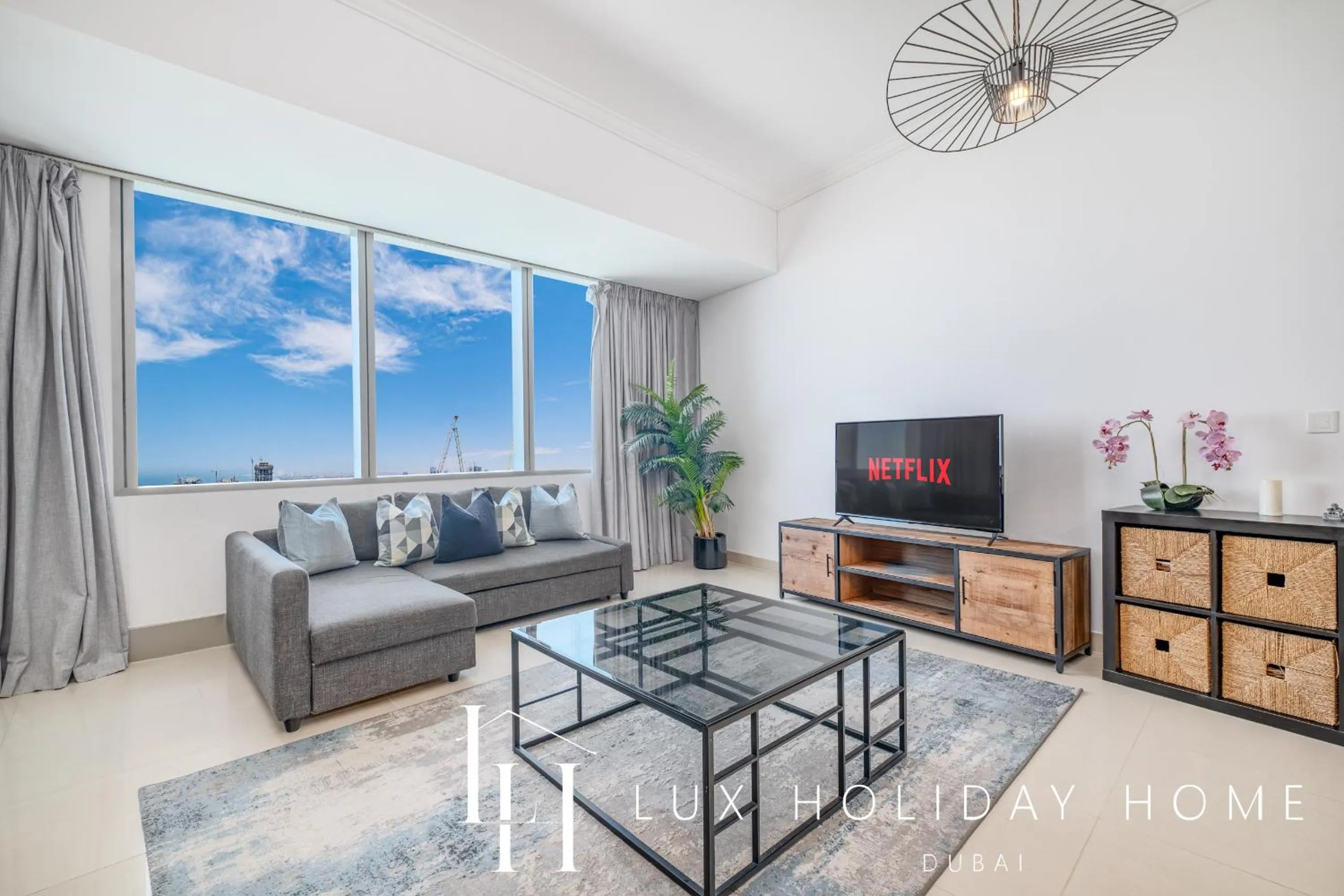 Living room in LUX The Sky View Suite Dubai Marina