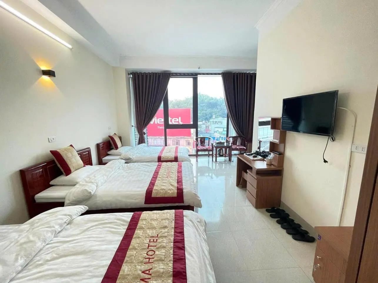 Bed in TRUC LAM HOTEL