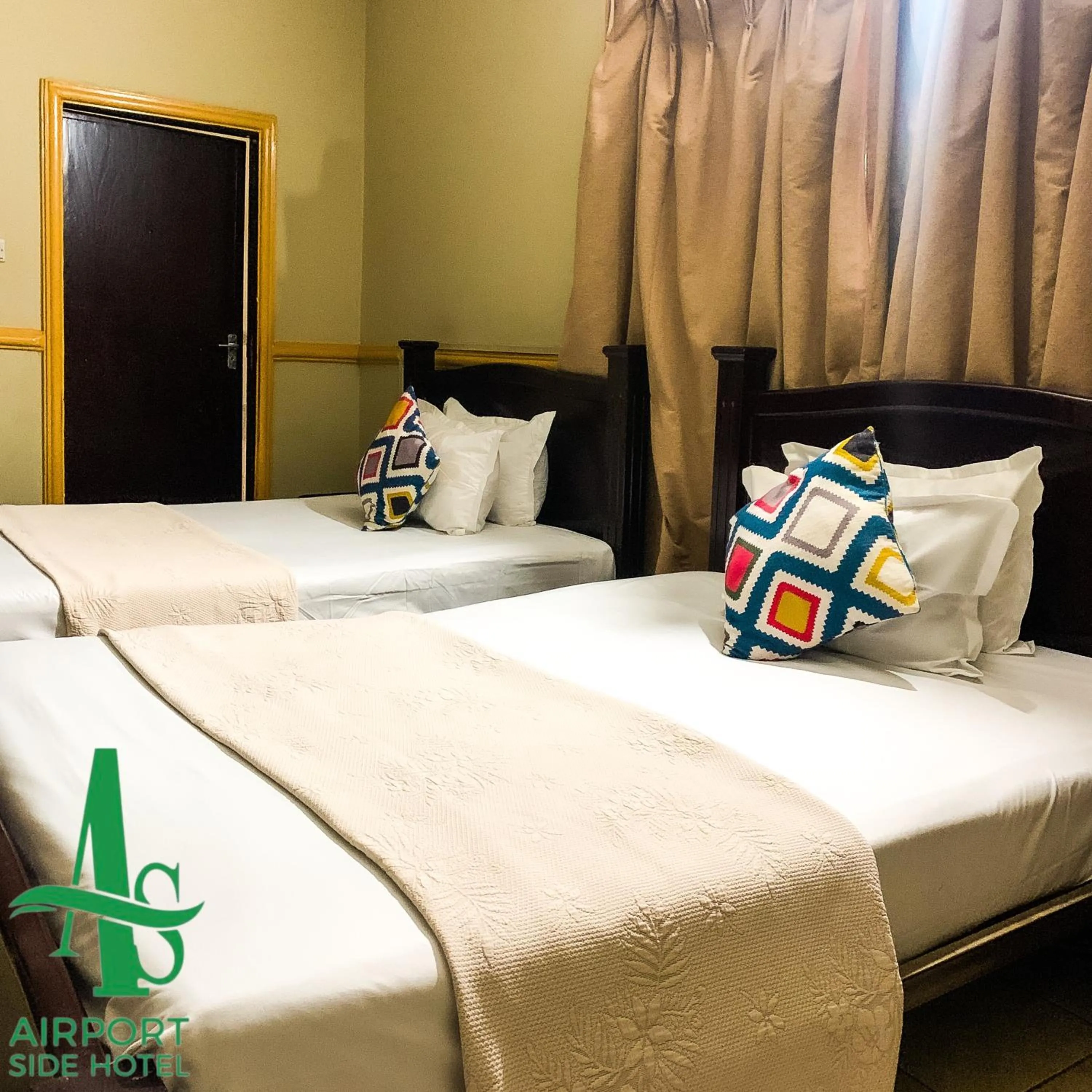 Bed in Airport Side Hotel