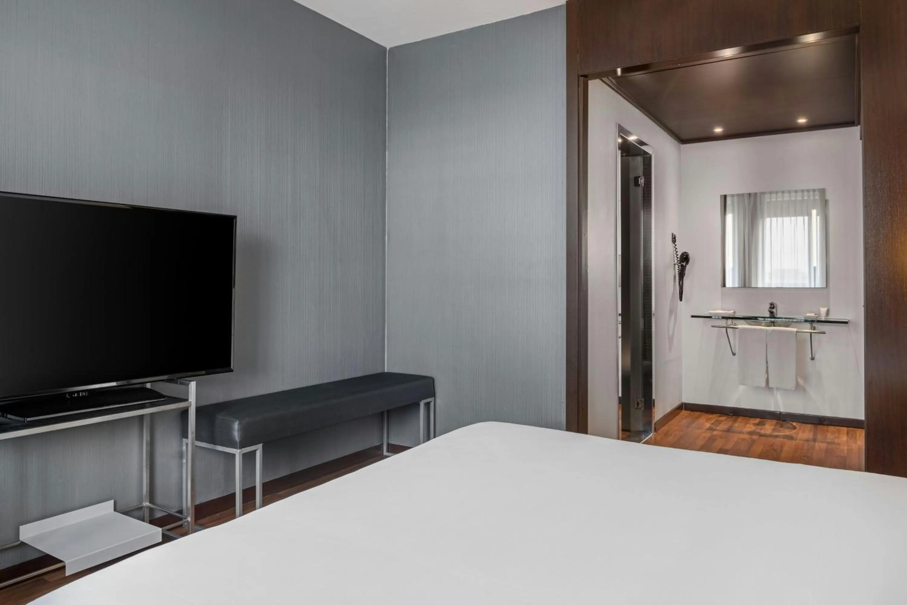 Photo of the whole room, Bed in AC Hotel by Marriott Pisa