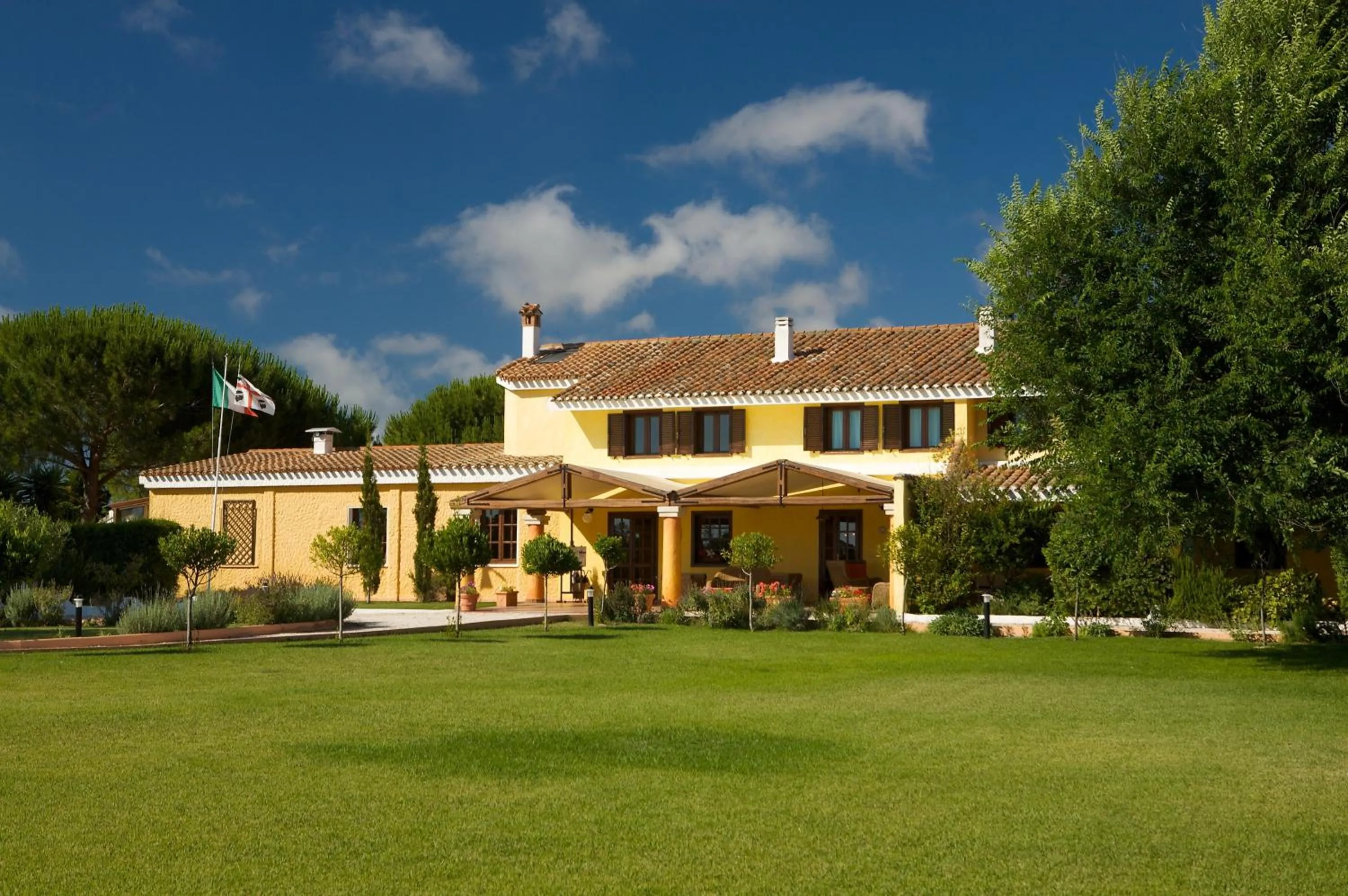 Facade/entrance in Is Benas Country Lodge