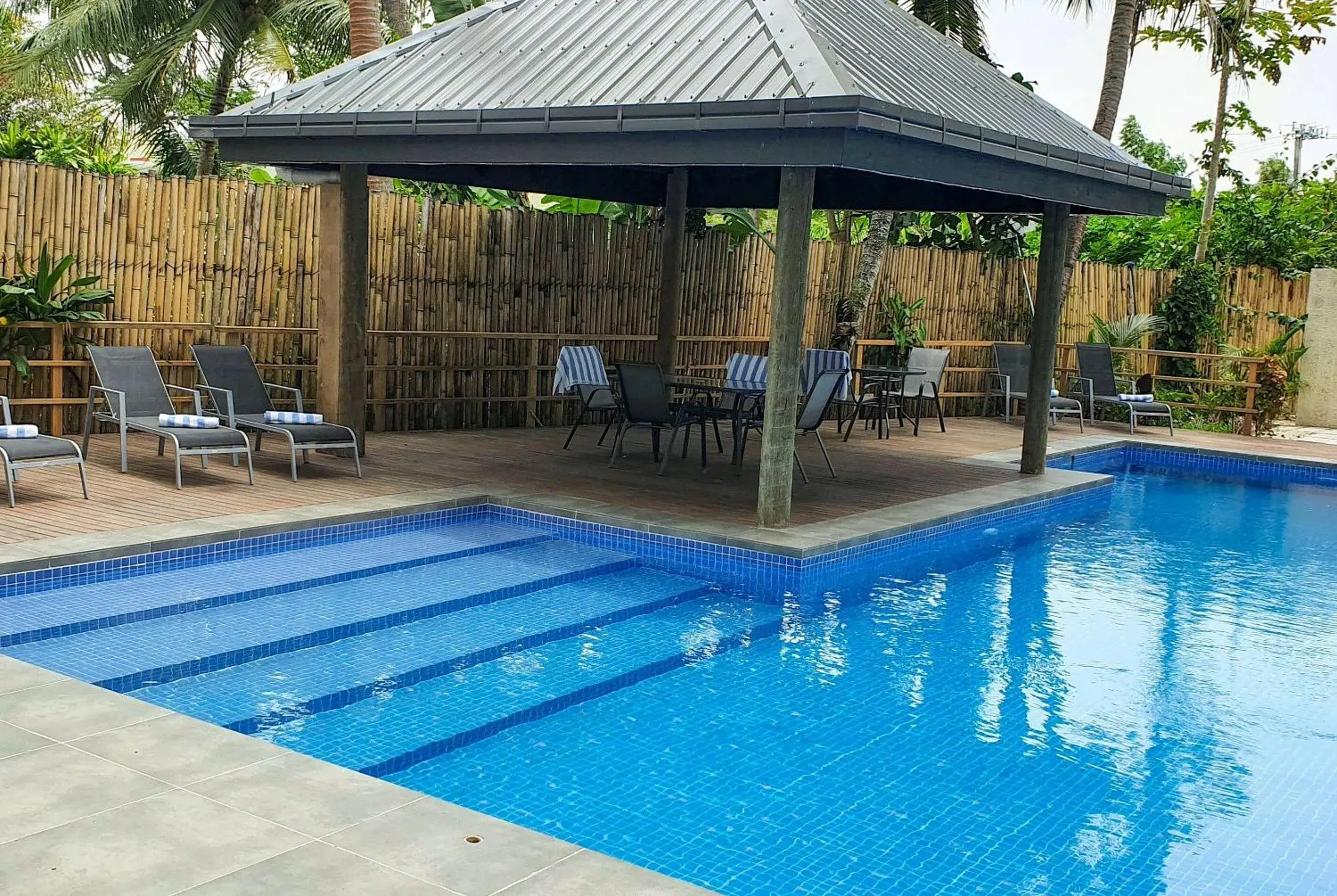 Pool view in Ramada Suites By Wyndham Seafront Coral Coast Pool view in Ramada Suites By Wyndham Seafront Coral Coast