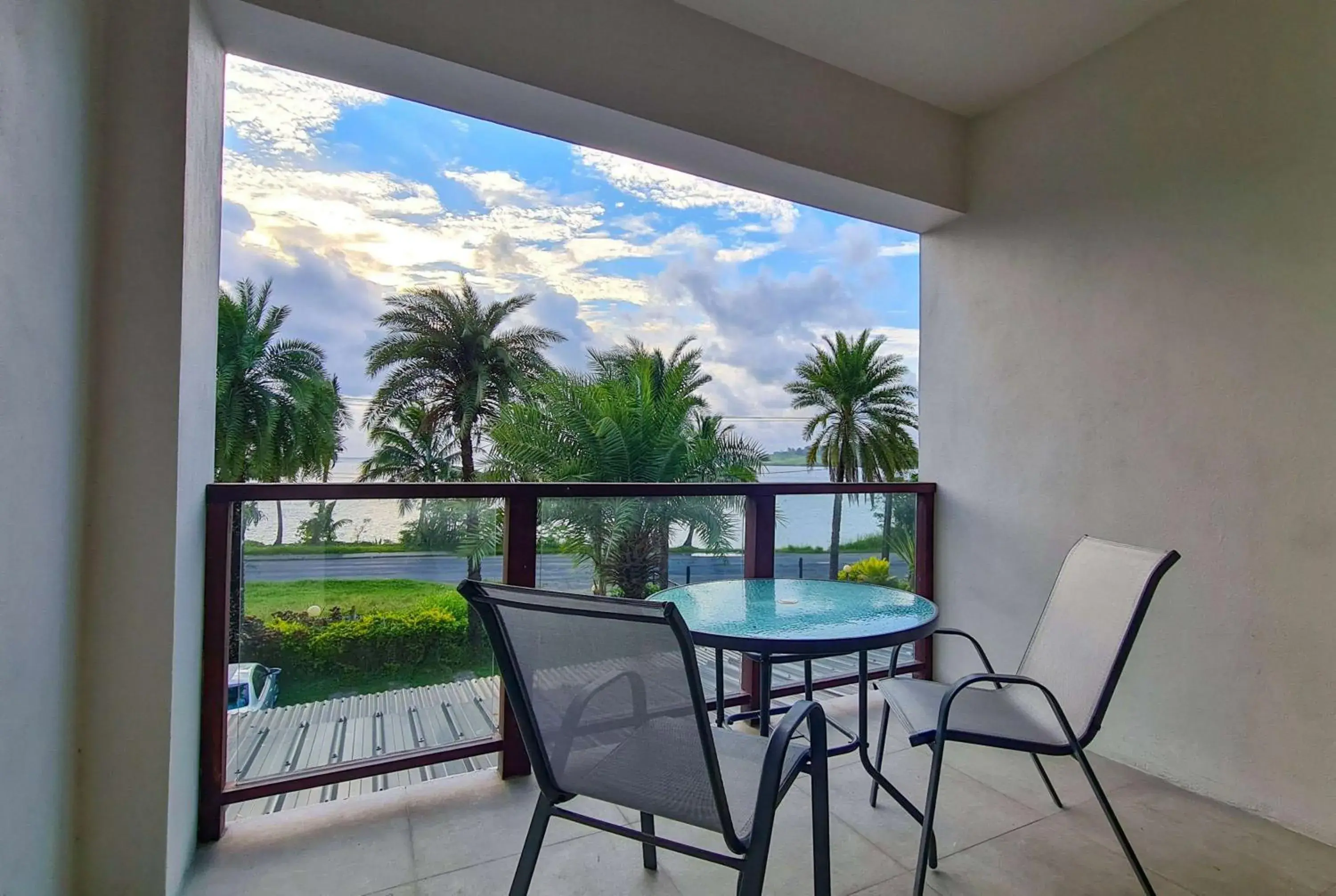 Photo of the whole room in Ramada Suites By Wyndham Seafront Coral Coast Photo of the whole room in Ramada Suites By Wyndham Seafront Coral Coast