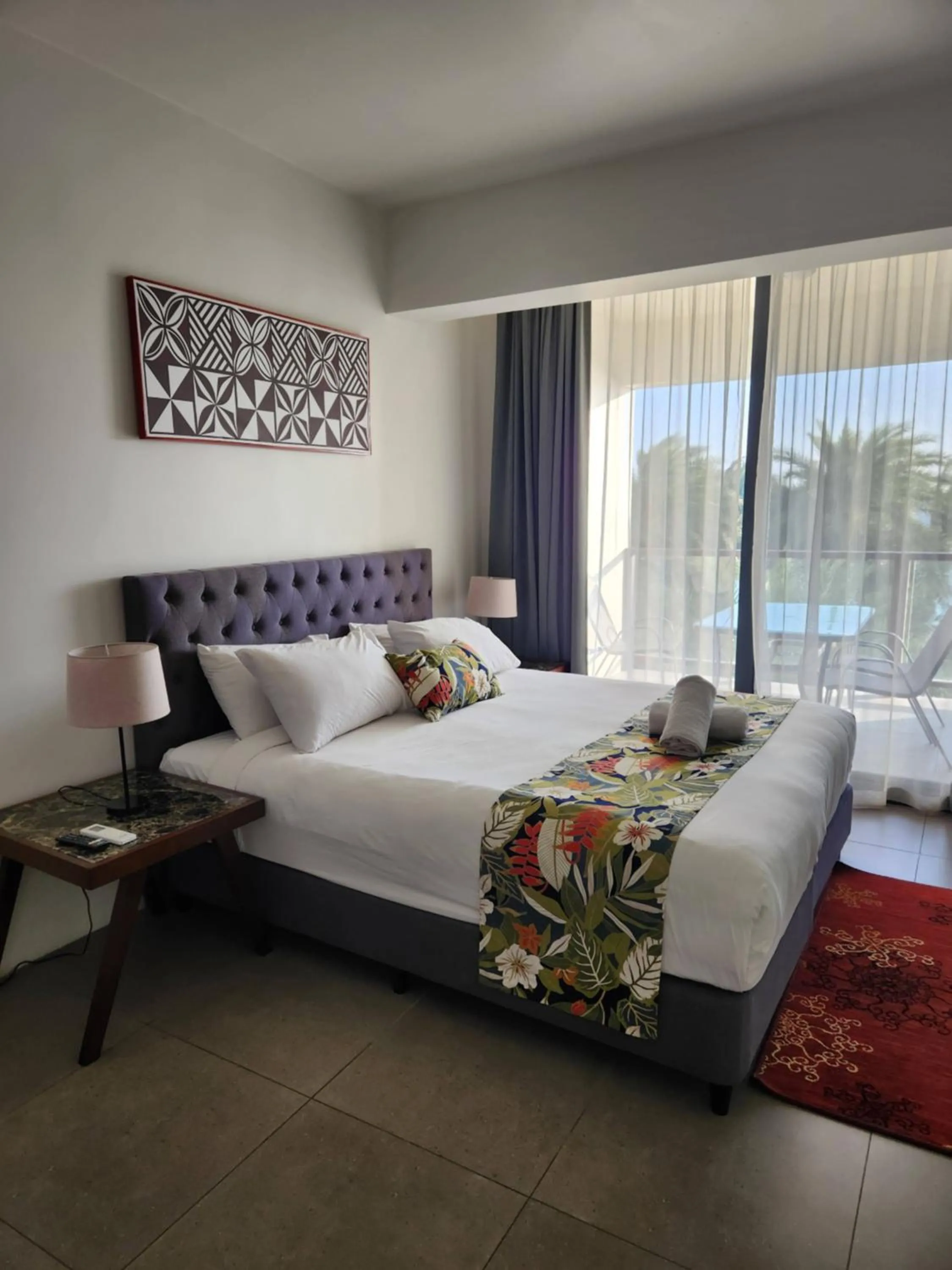 Bed in Ramada Suites By Wyndham Seafront Coral Coast