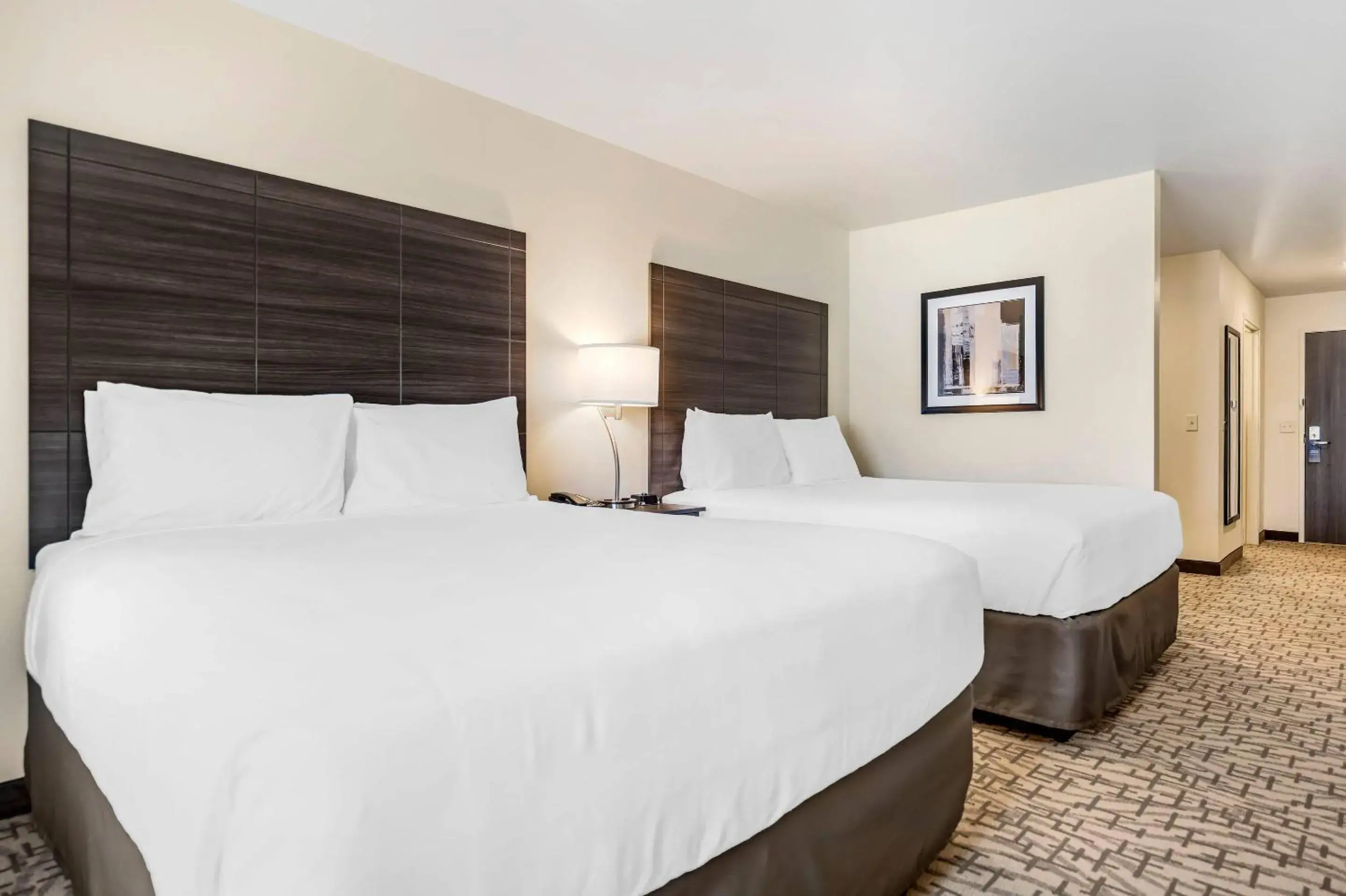 Bedroom, Bed in Comfort Inn & Suites Medina NY near Erie Canal Bedroom, Bed in Comfort Inn & Suites Medina NY near Erie Canal