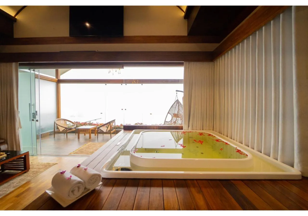 Shower in Chandys Drizzle Drops - Munnar Top Station