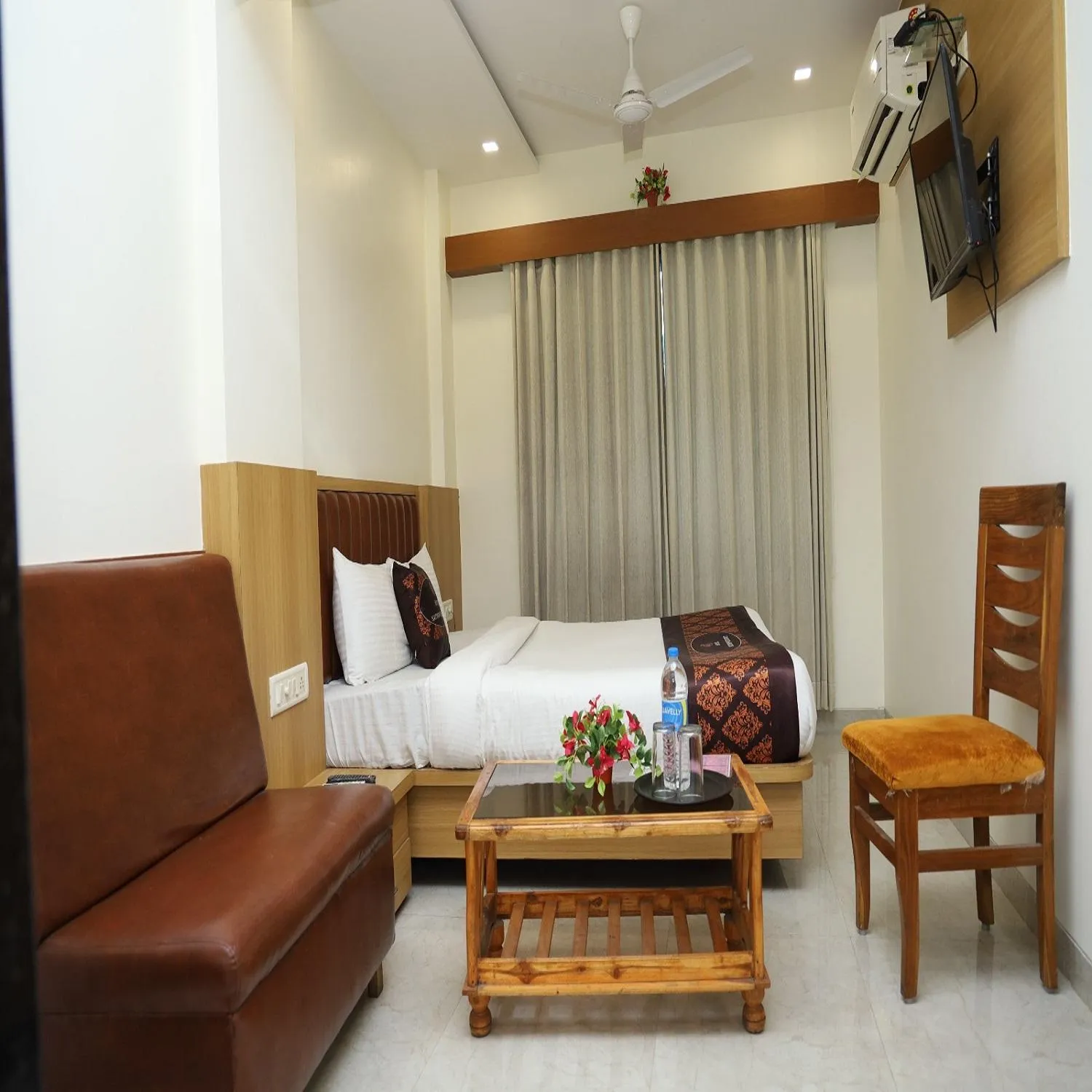 Photo of the whole room, Bed in Hotel Satyam Residency