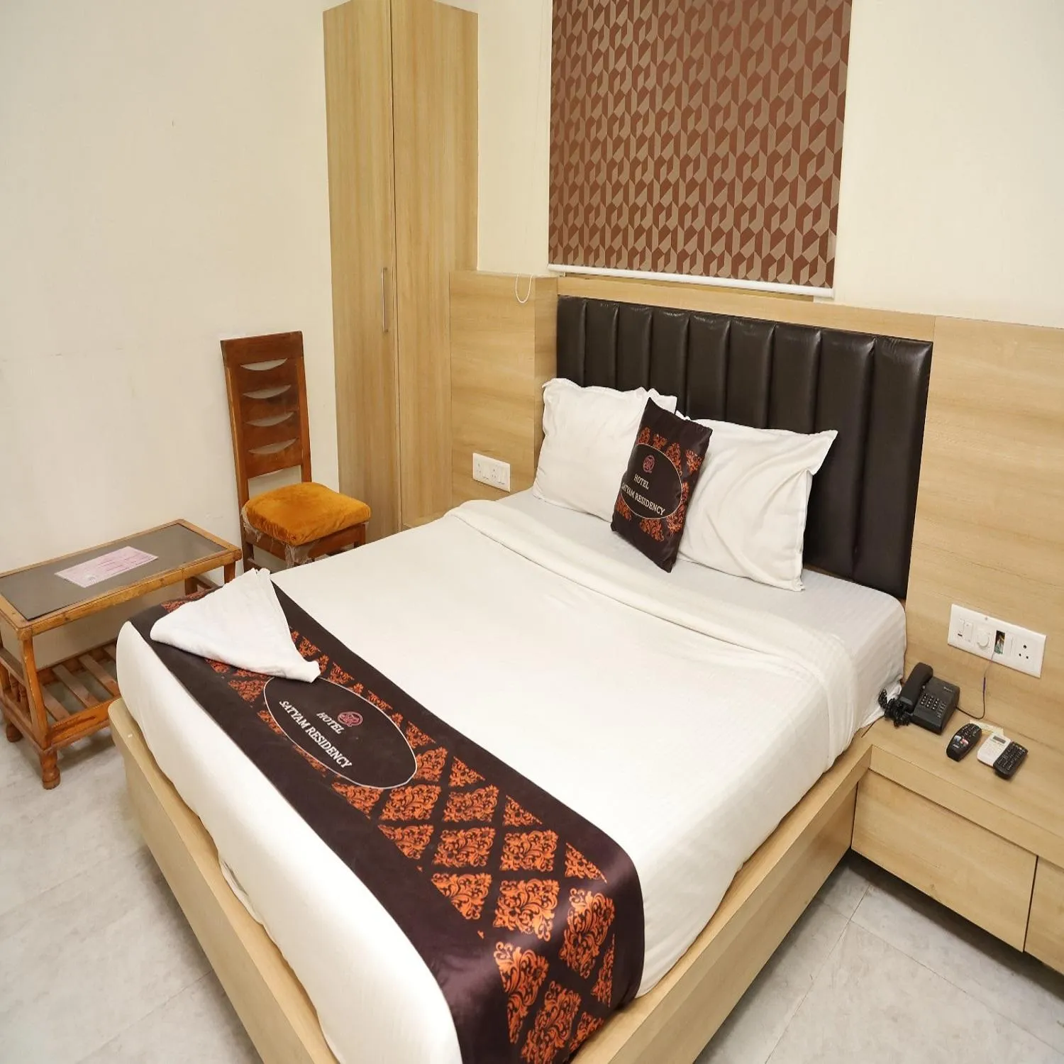 Bed in Hotel Satyam Residency