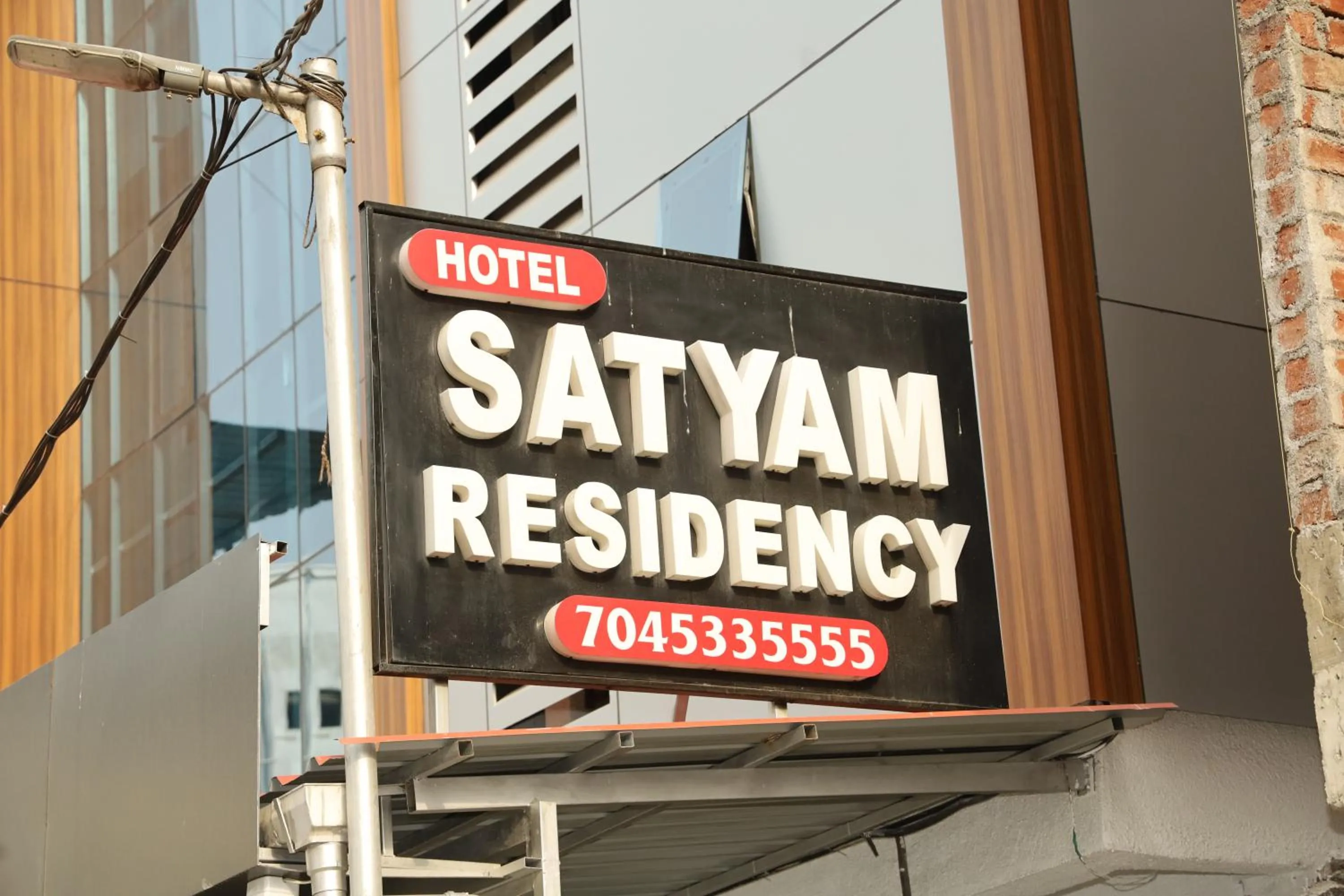 Logo/Certificate/Sign in Hotel Satyam Residency