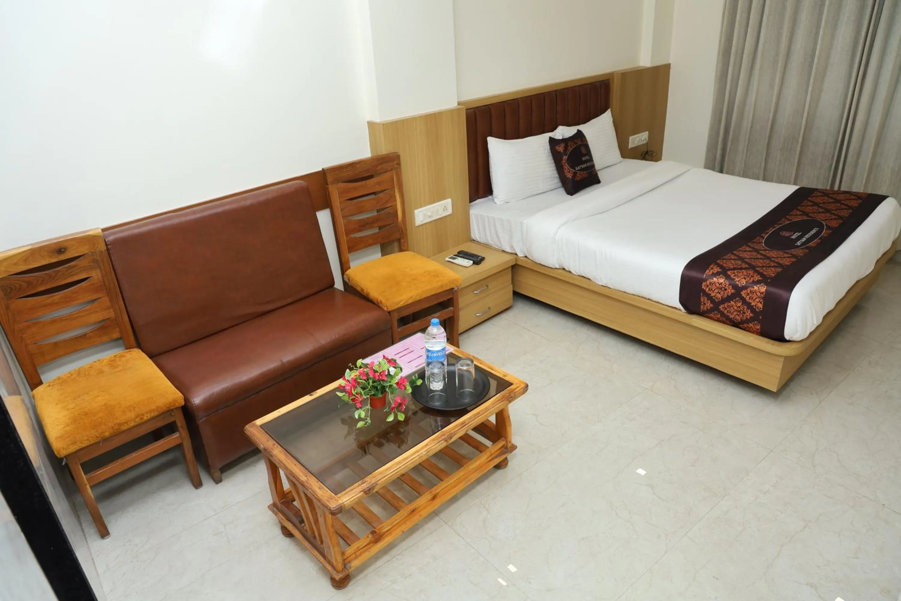 Photo of the whole room, Bed in Hotel Satyam Residency
