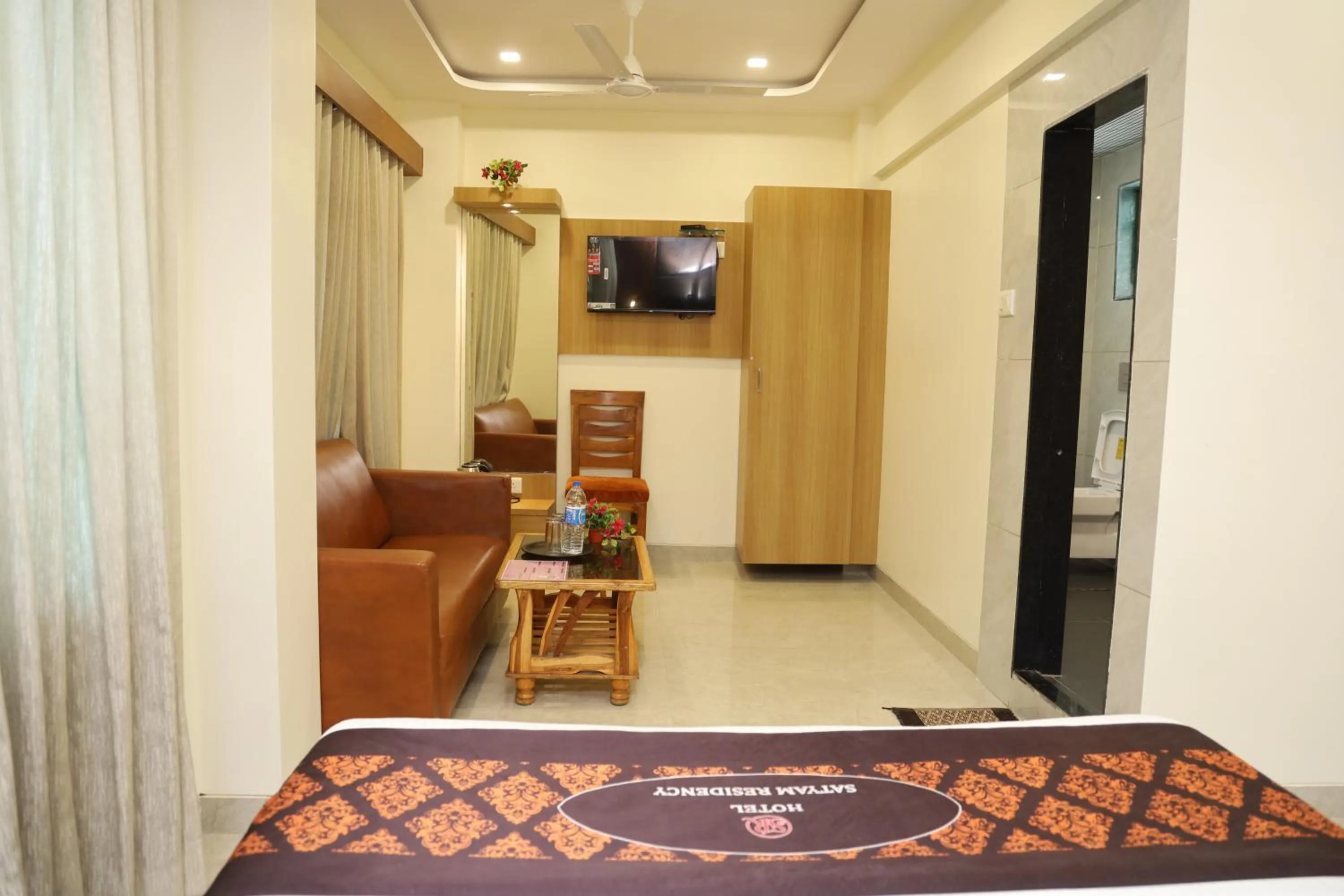 Bedroom in Hotel Satyam Residency