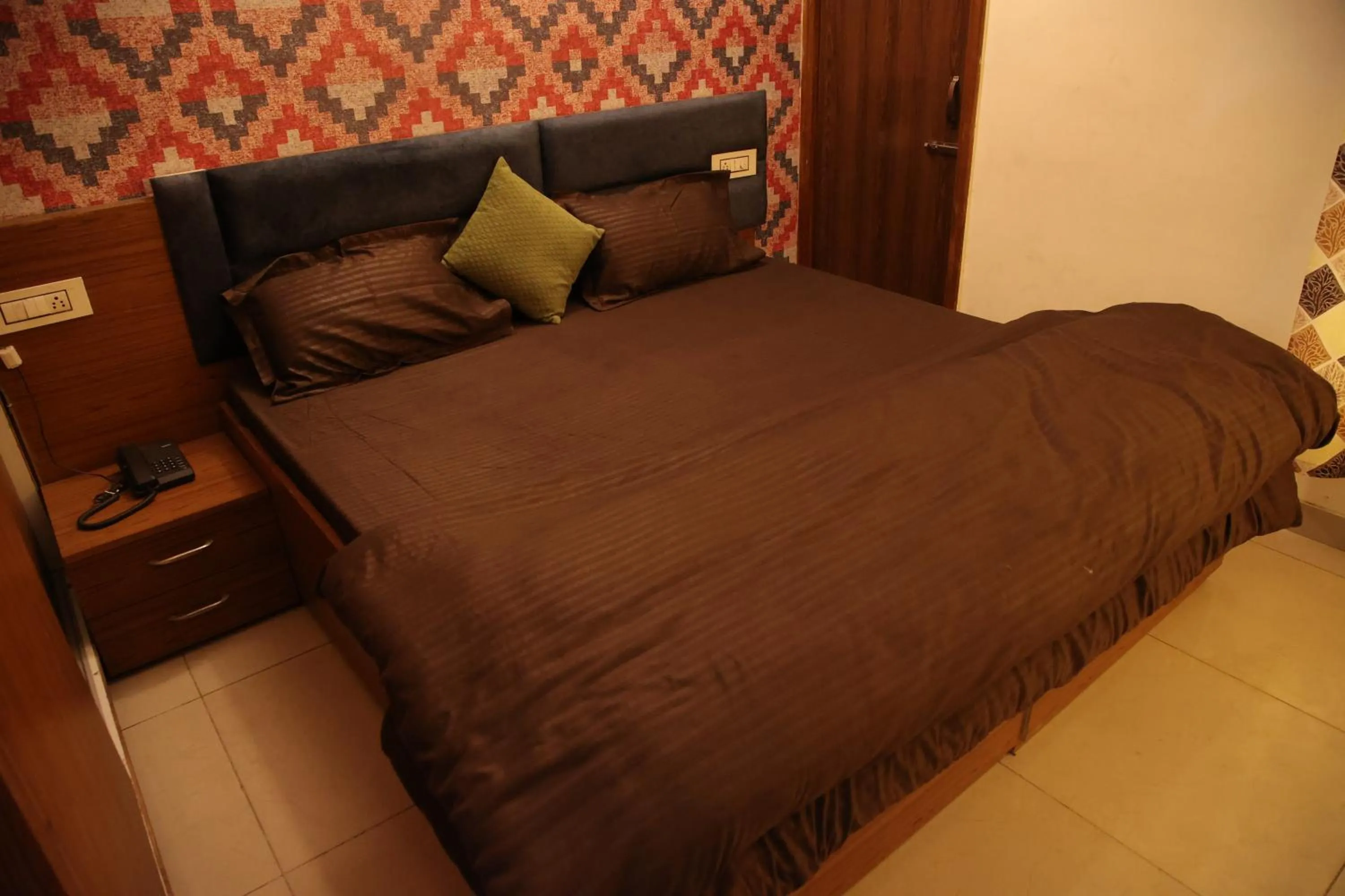 Bedroom in Hotel O Galaxy Stays