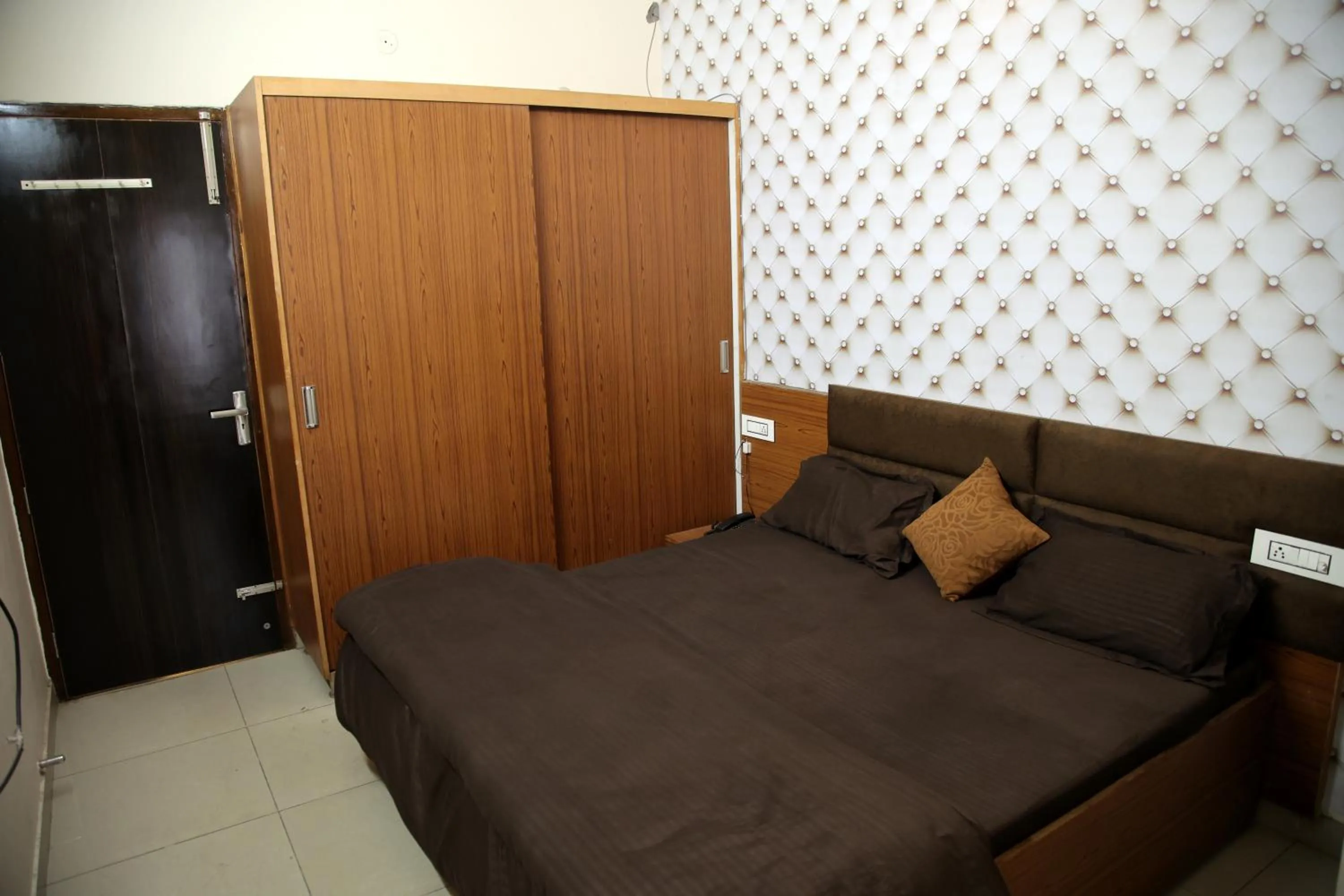 Bedroom in Hotel O Galaxy Stays