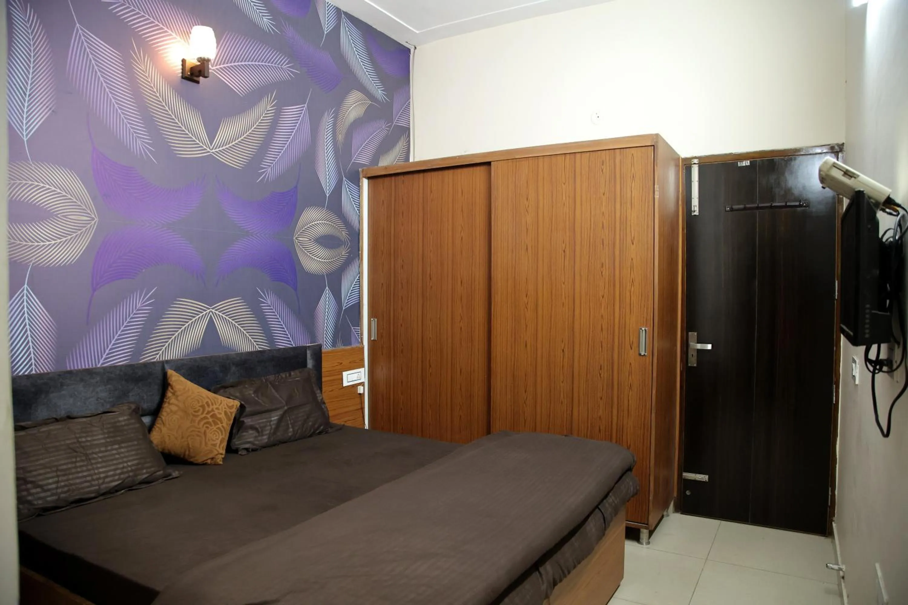 Bedroom in Hotel O Galaxy Stays