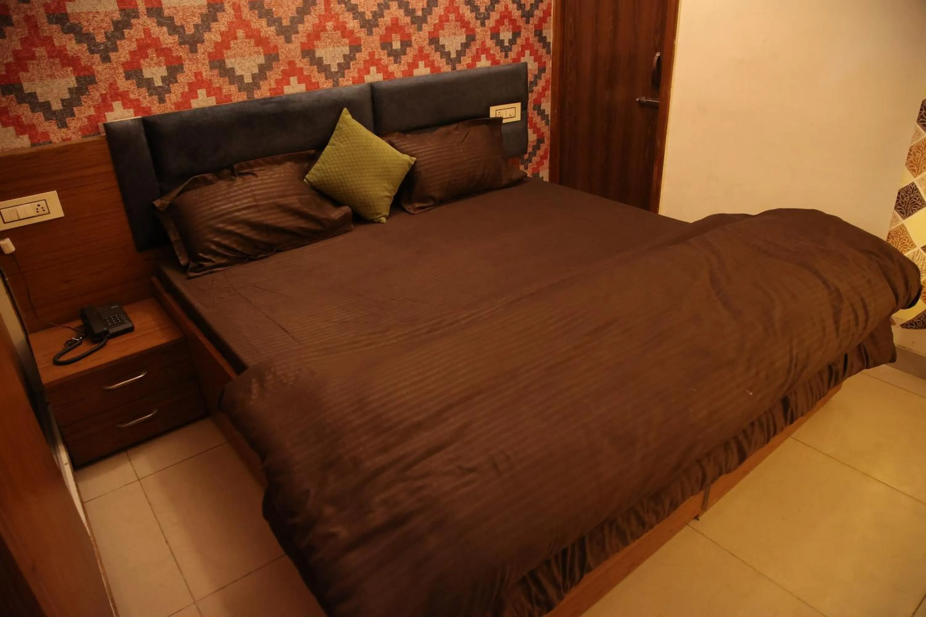 Bedroom in Hotel O Galaxy Stays