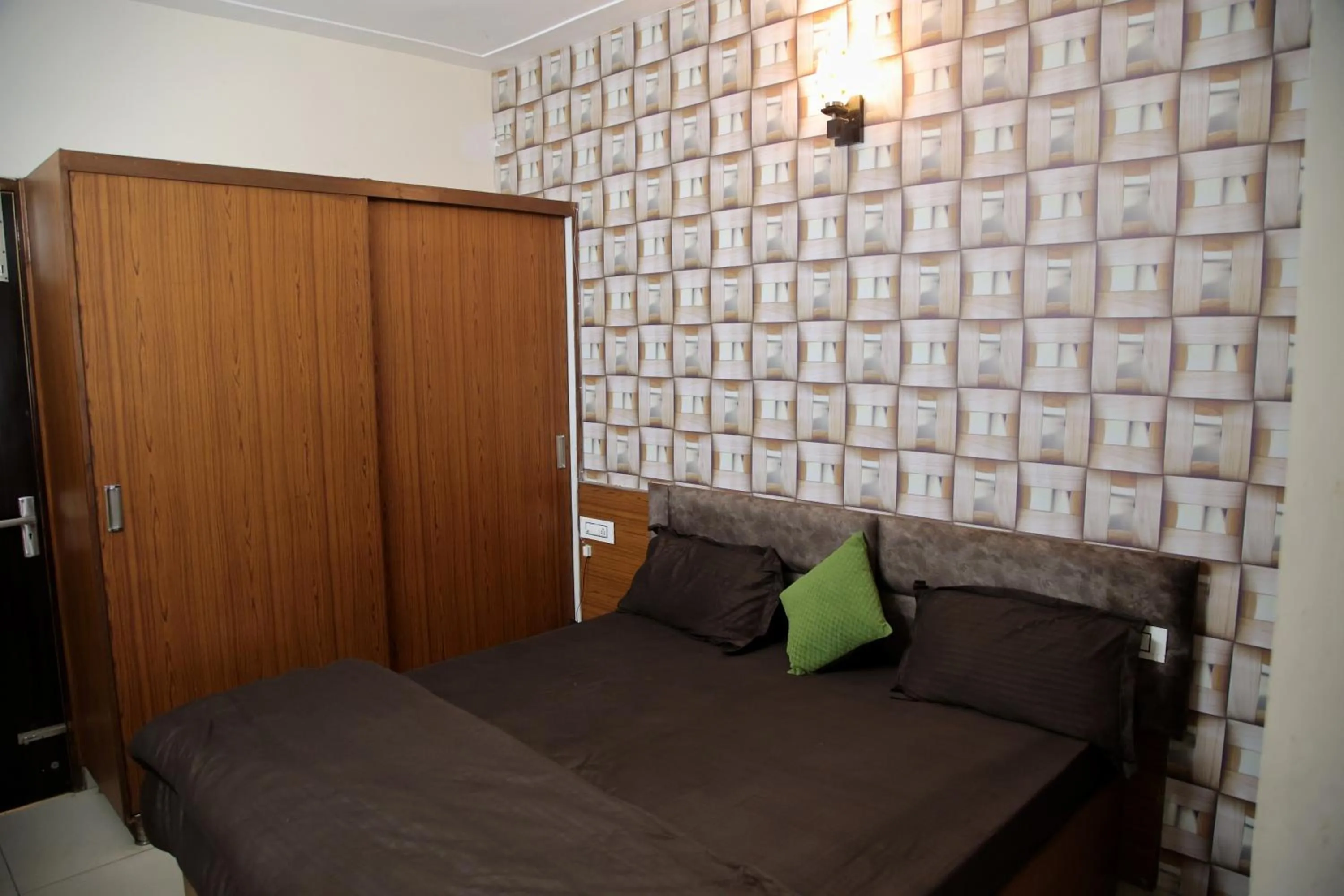 Bedroom in Hotel O Galaxy Stays