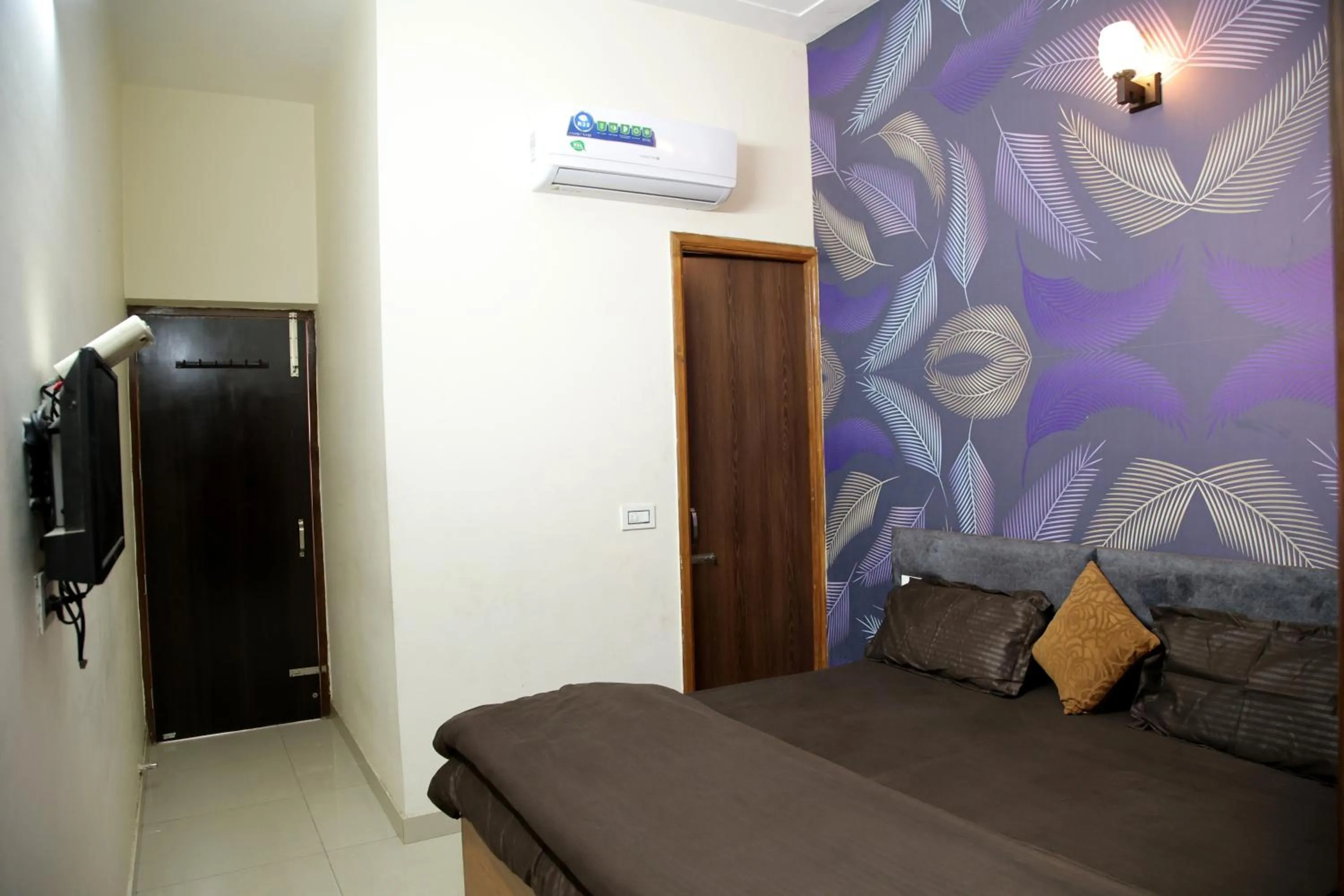 Bedroom in Hotel O Galaxy Stays